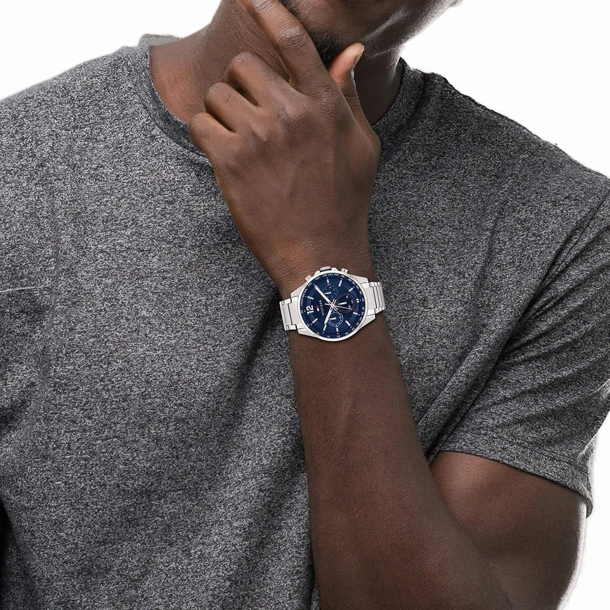 Tommy Hilfiger Max watch on wrist with gray t-shirt casual styling