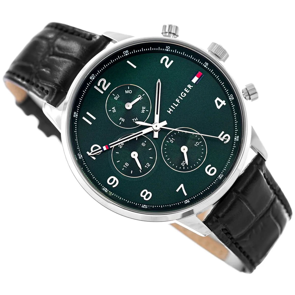 Angled view of Tommy Hilfiger watch with green dial, silver case, and black leather strap