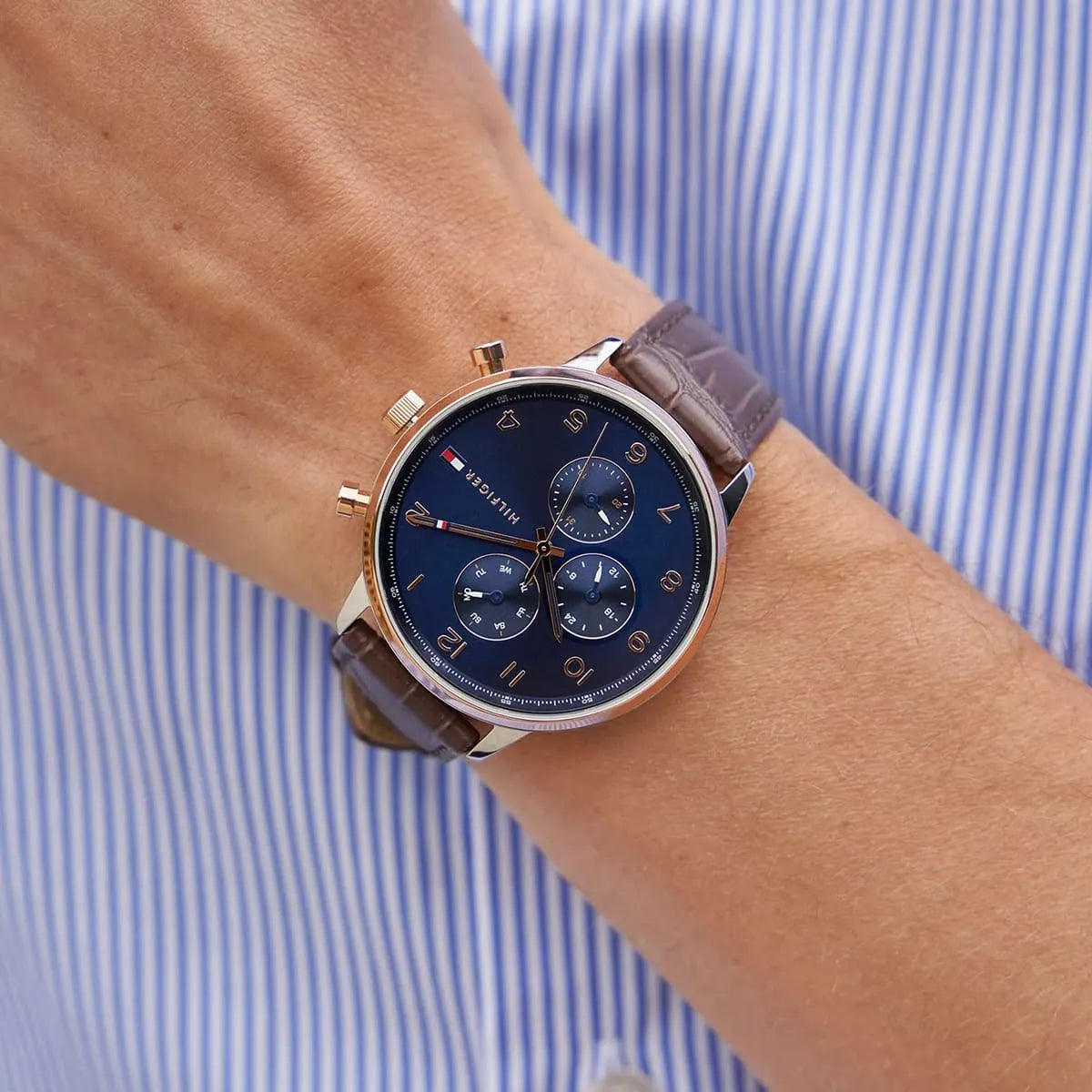 Tommy Hilfiger Leonard watch styled on planner with natural decor