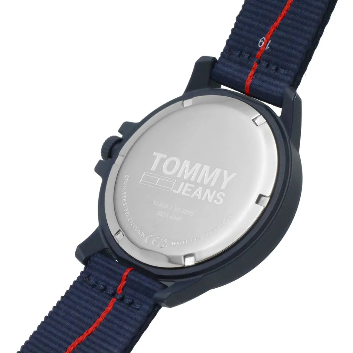 Tommy Hilfiger caseback showing TOMMY JEANS branding and watch specifications