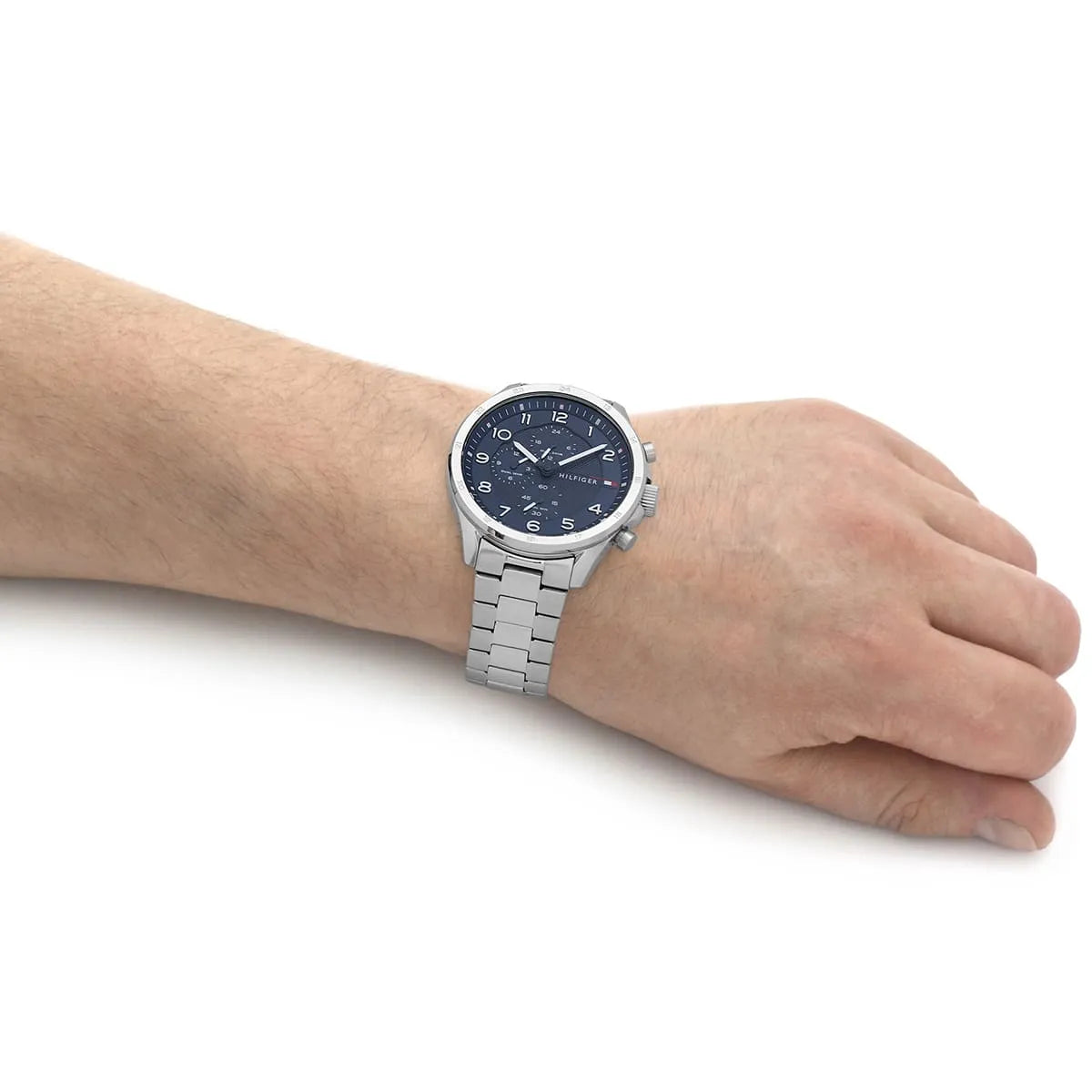 Tommy Hilfiger Axel chronograph watch worn on wrist with blue dial visible