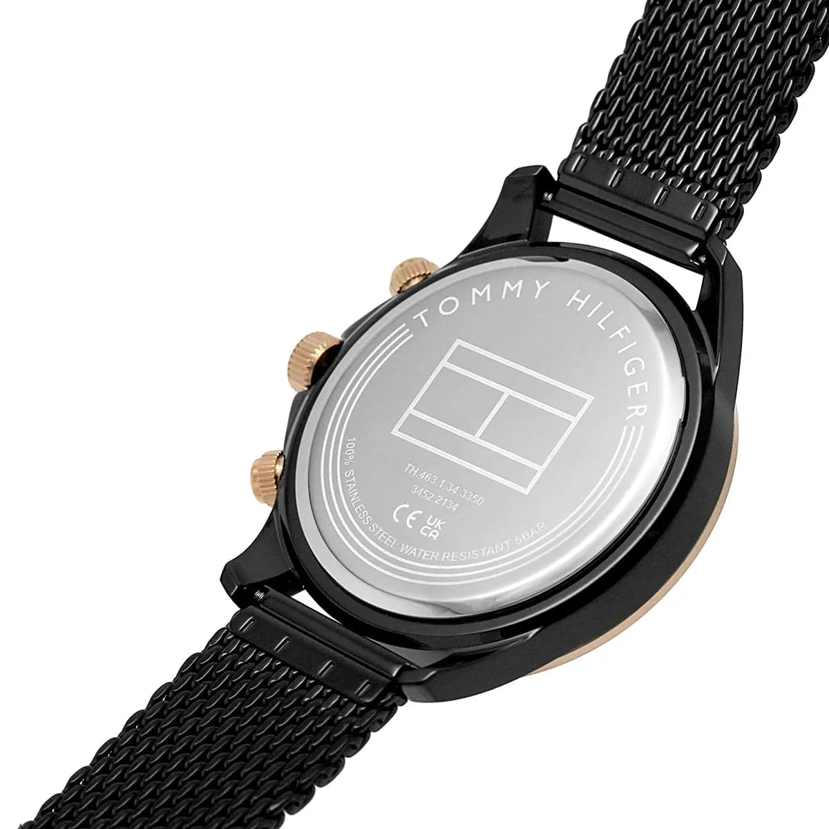 Tommy Hilfiger watch caseback showing brand logo and dial side