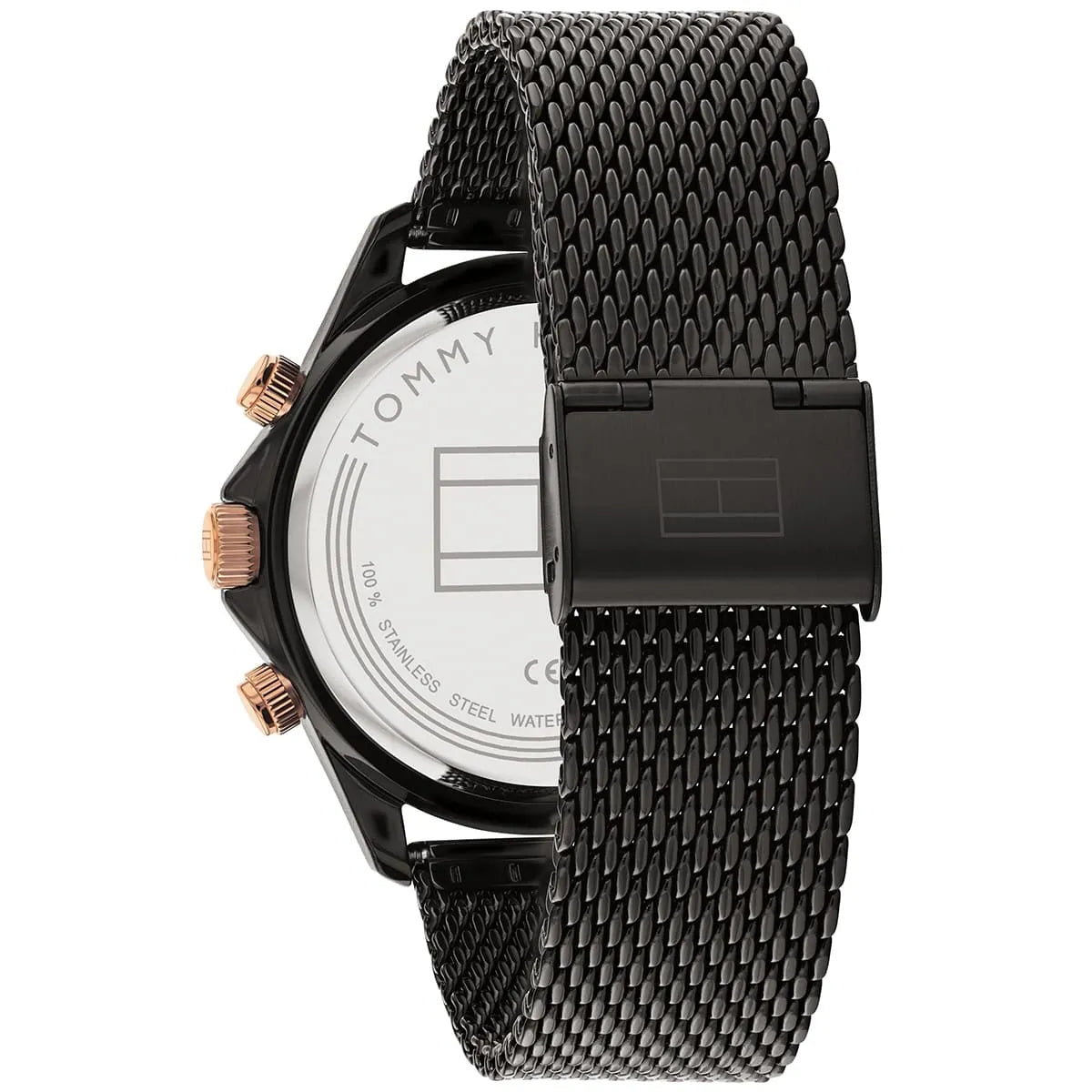 Side view of Tommy Hilfiger watch showing black case and mesh strap with closure