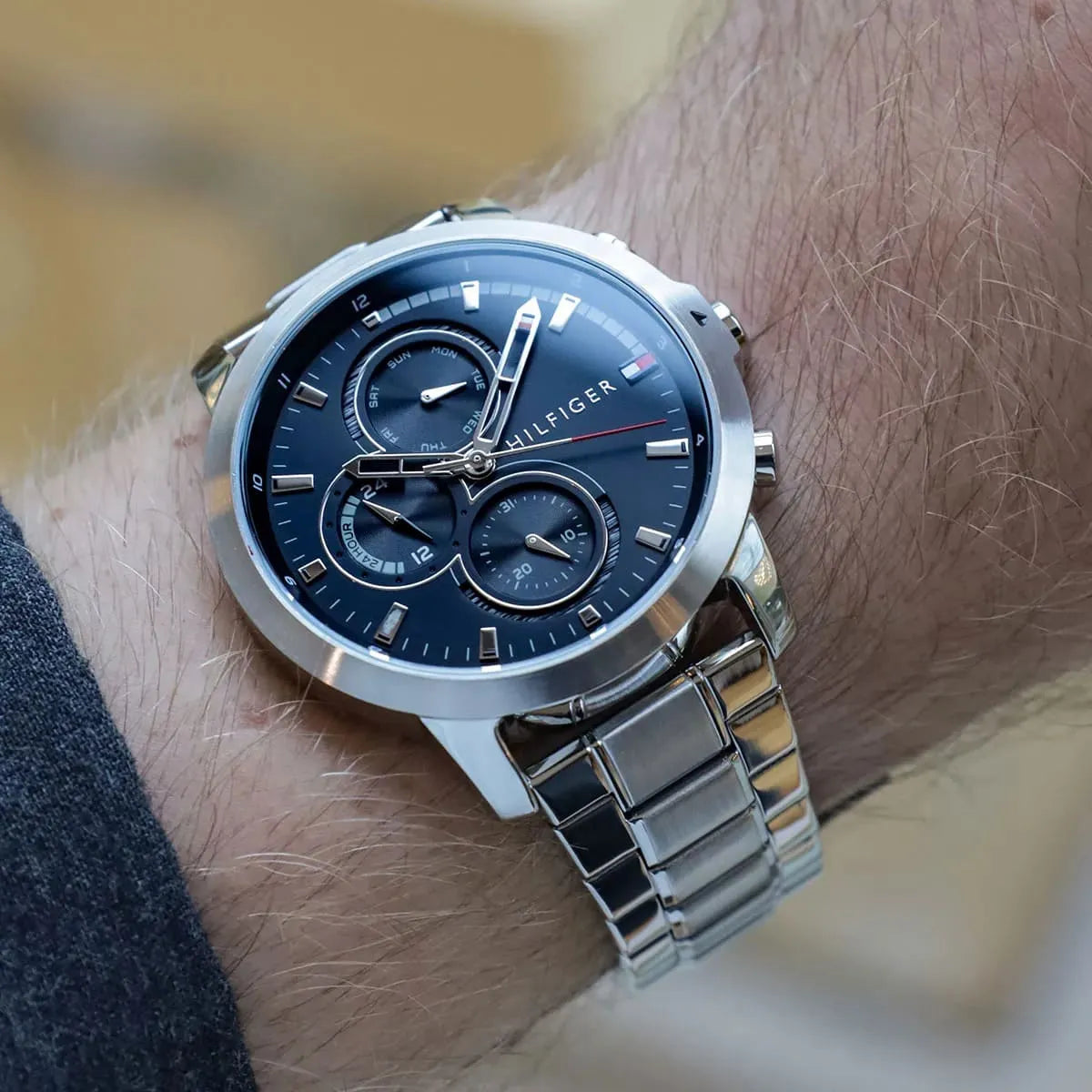 Tommy Hilfiger men's chronograph watch on wrist showing black dial and subdials