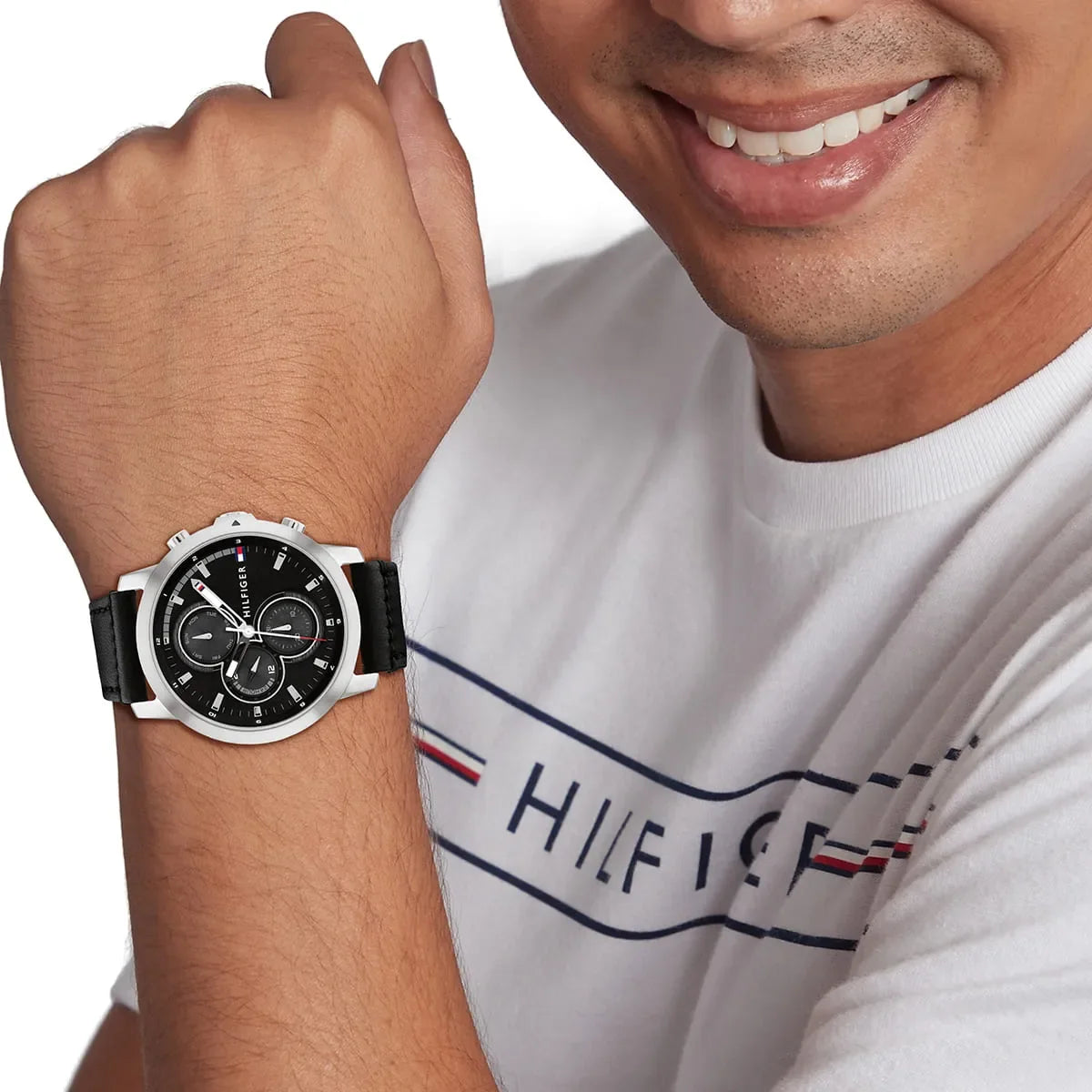 Tommy Hilfiger Jameson watch worn on wrist showing black dial chronograph with white markers and hands
