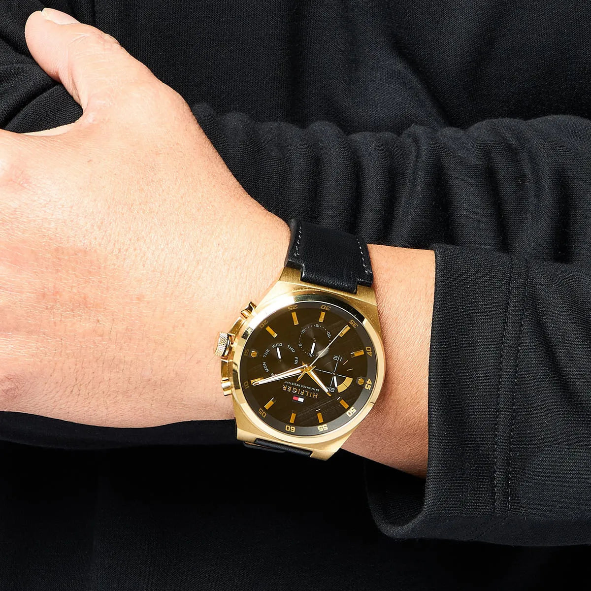 Tommy Hilfiger Dexter watch worn on wrist with black leather strap