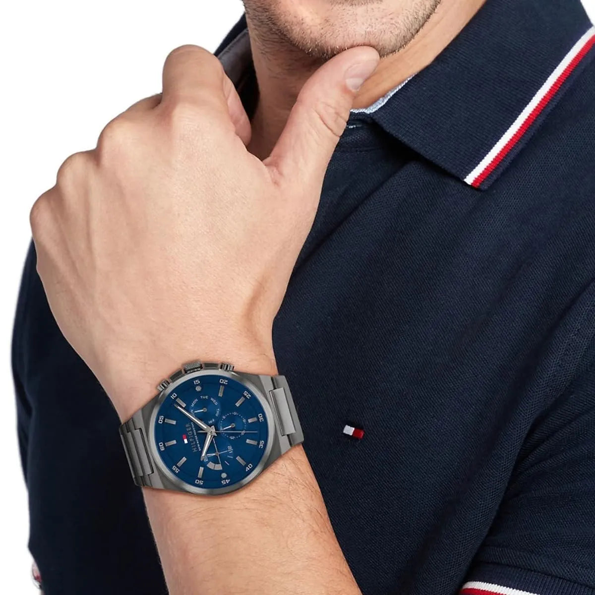 Tommy Hilfiger Dexter multifunction watch on wrist with polo shirt