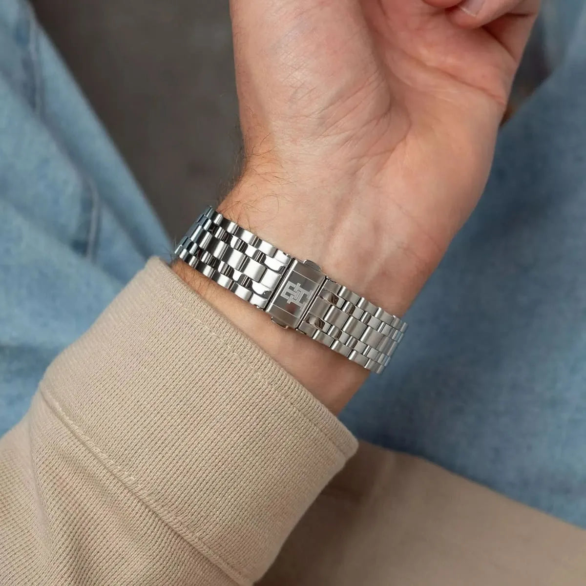 Tommy Hilfiger TH85 worn on wrist displaying stainless steel band and case