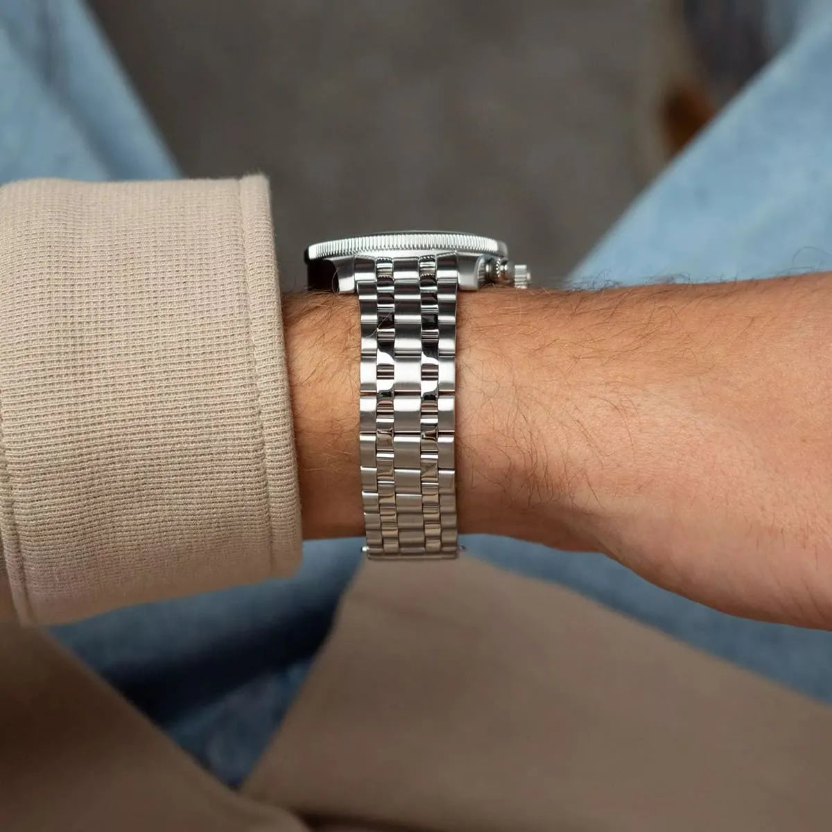 Tommy Hilfiger TH85 watch side view on wrist showing stainless steel bracelet