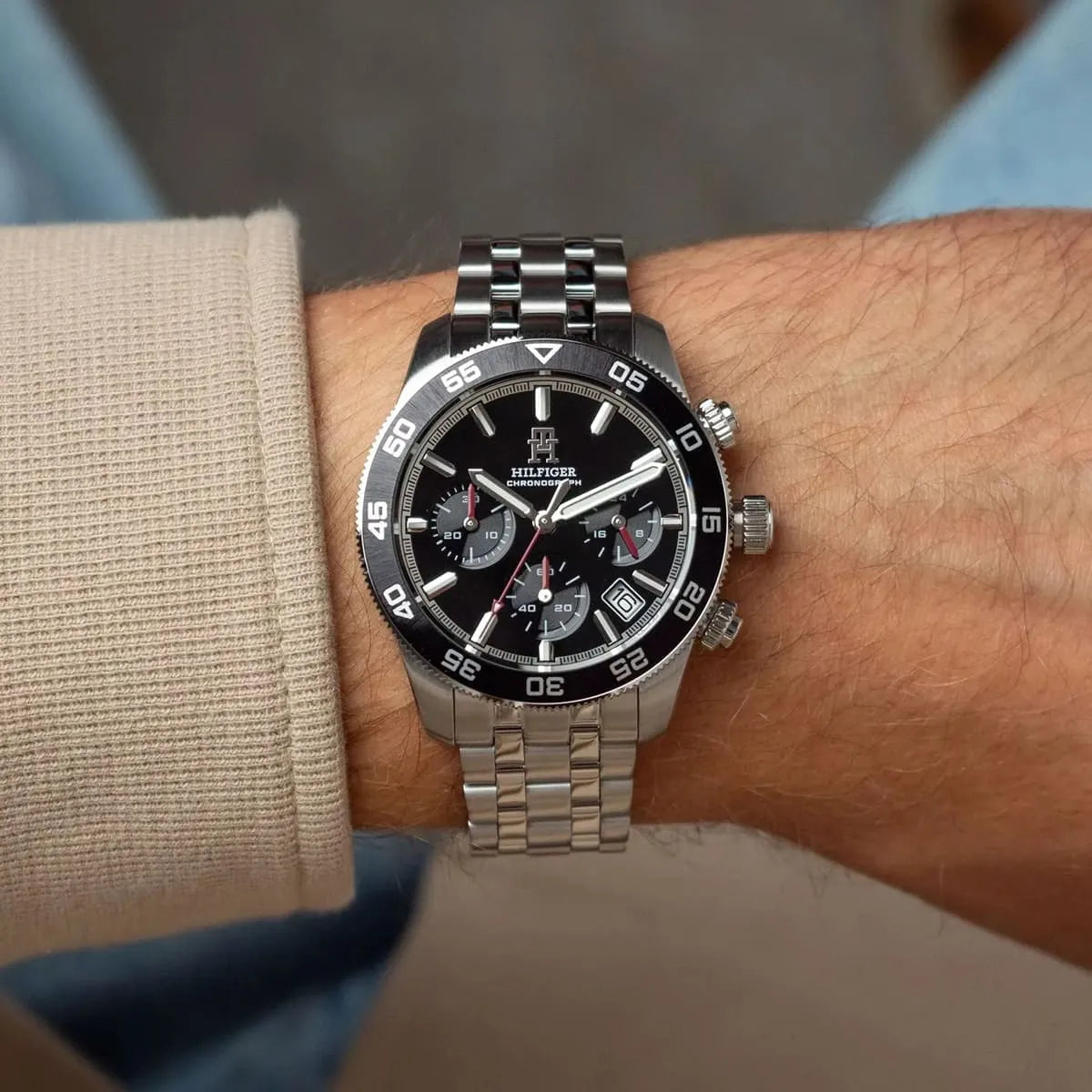 Tommy Hilfiger TH85 chronograph worn on wrist with black dial visible