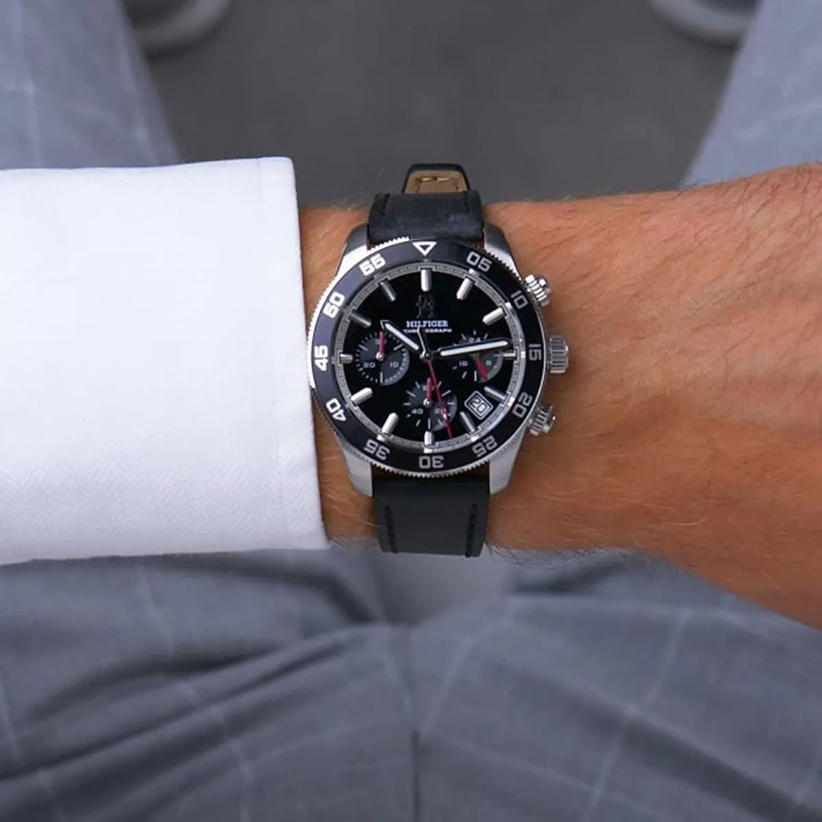 Tommy Hilfiger TH85 chronograph watch worn on wrist over white cuff