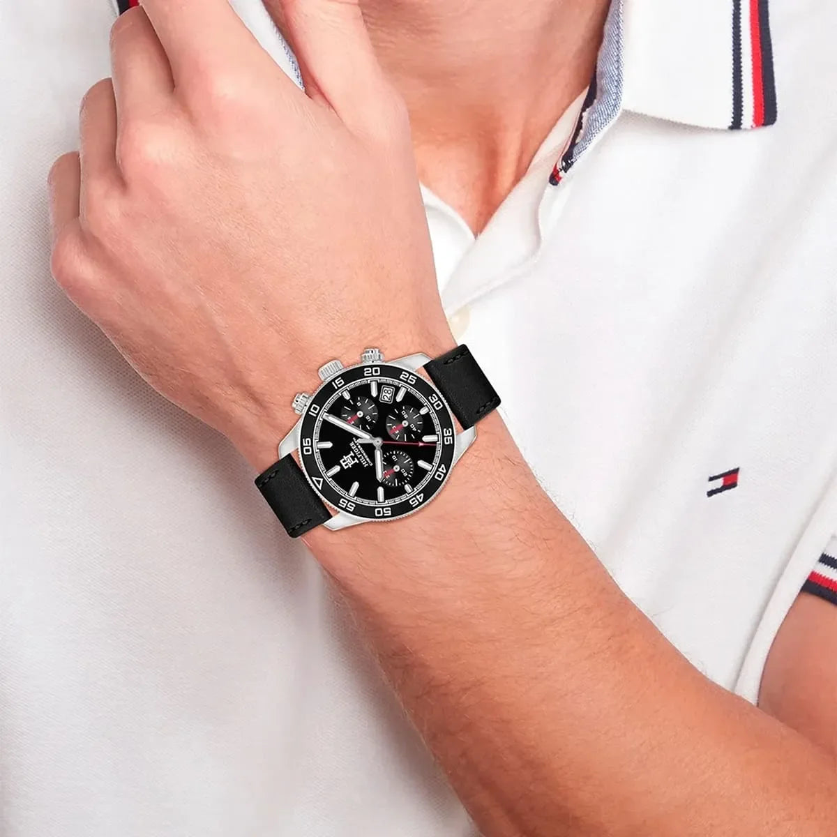 Tommy Hilfiger TH85 chronograph watch on wrist with white shirt cuff visible