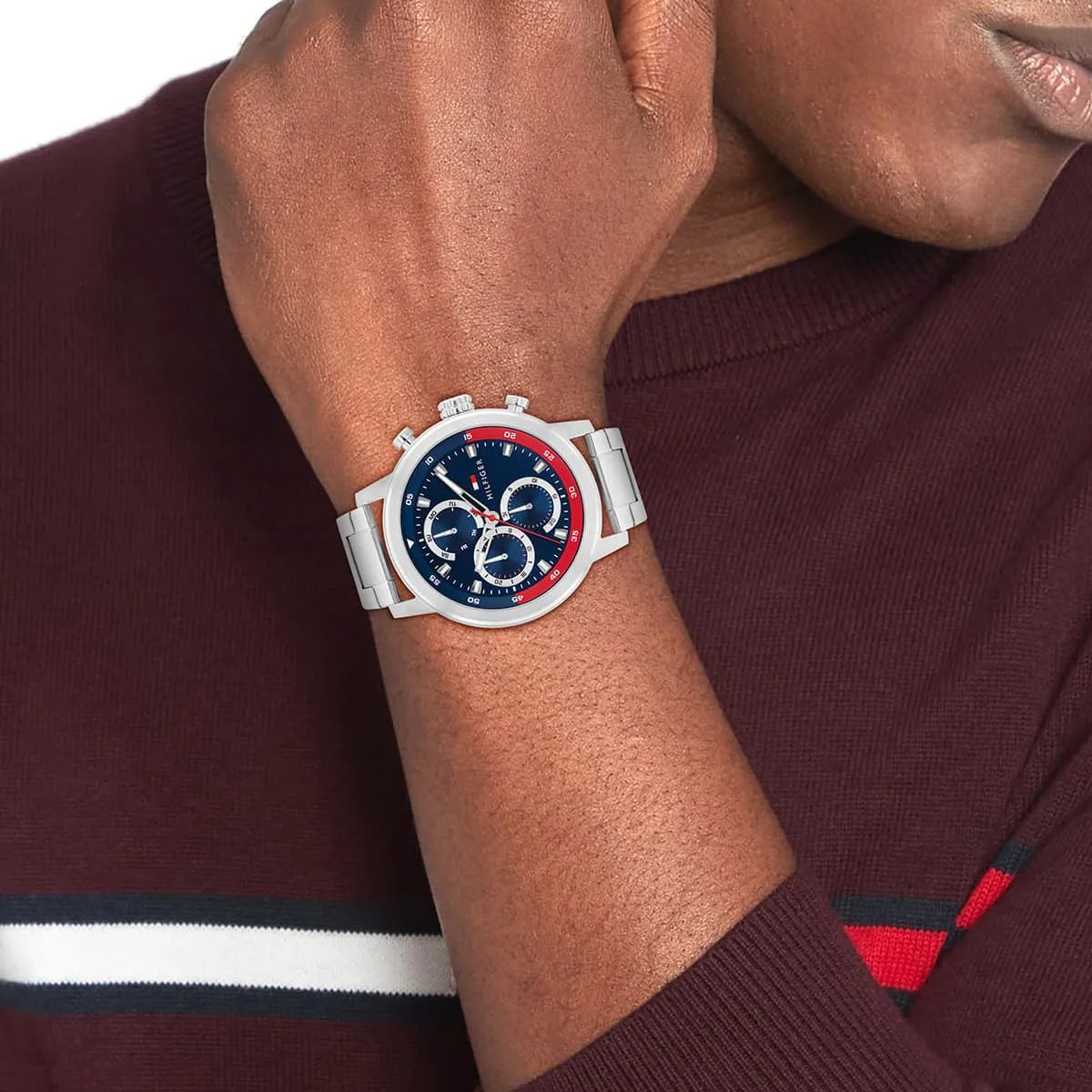 Tommy Hilfiger Rocky 46mm watch worn on wrist showing dial face and stainless steel bracelet