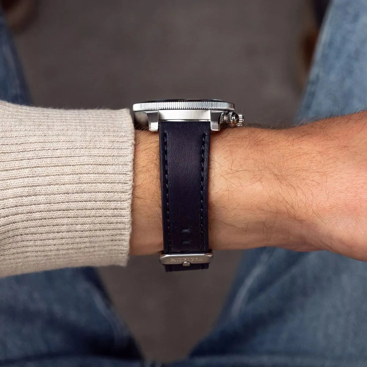 Close-up of Tommy Hilfiger chronograph watch worn on wrist from side angle