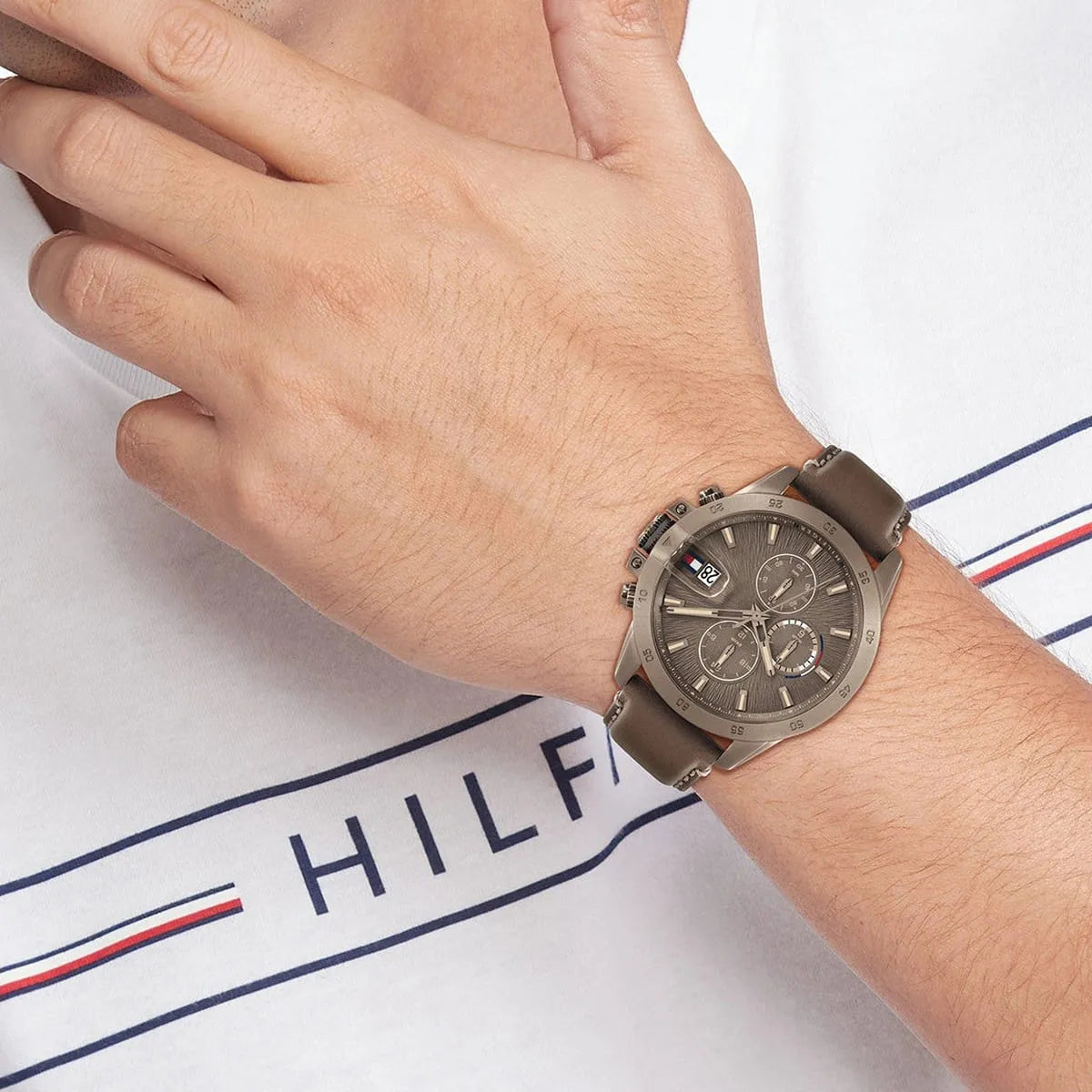 Tommy Hilfiger Jameson chronograph watch worn on wrist with brown leather strap