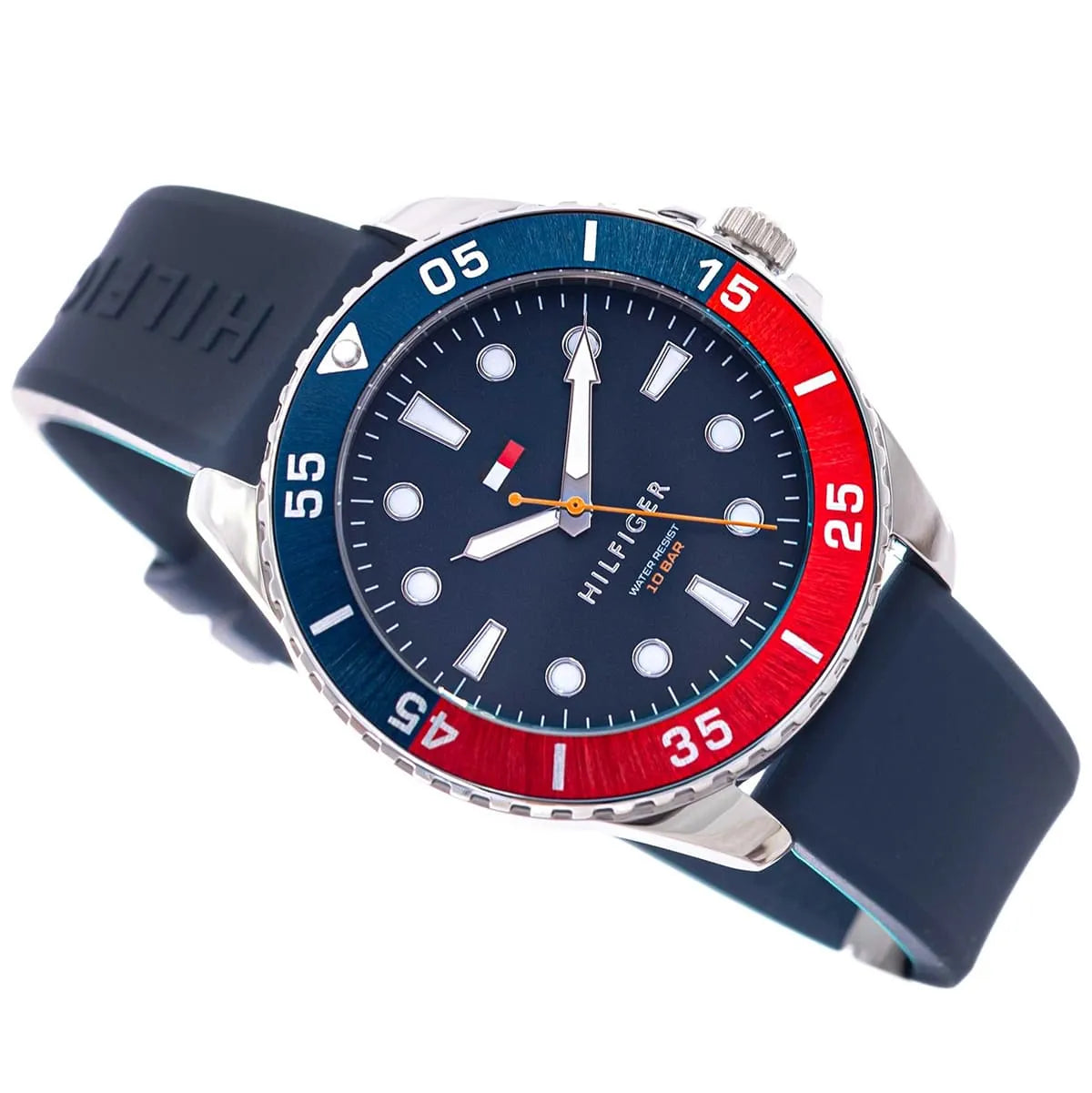 Tommy Hilfiger watch side view highlighting the blue dial, red bezel, and navy silicone band