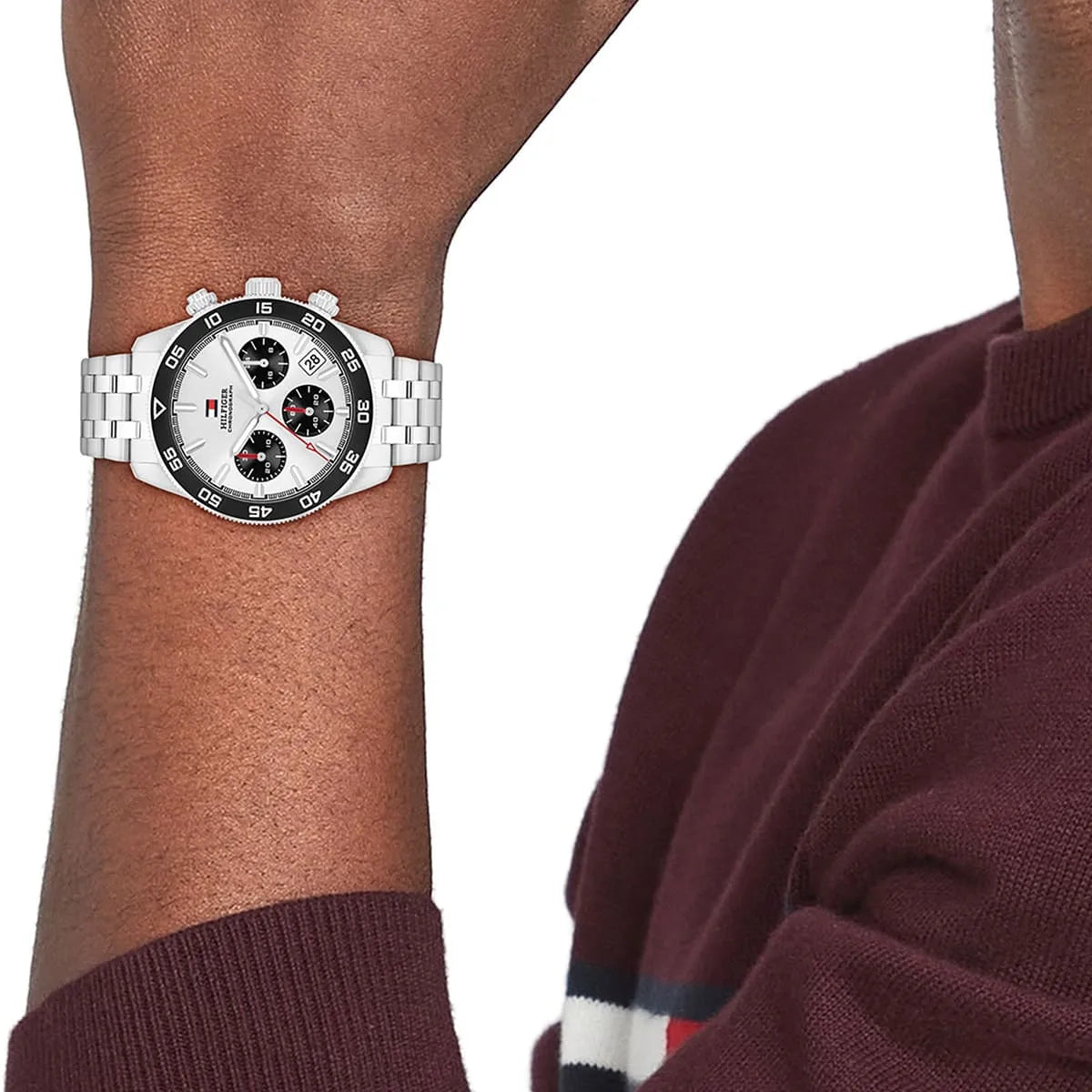 Tommy Hilfiger TH85 chronograph watch worn on wrist showing silver dial and black bezel
