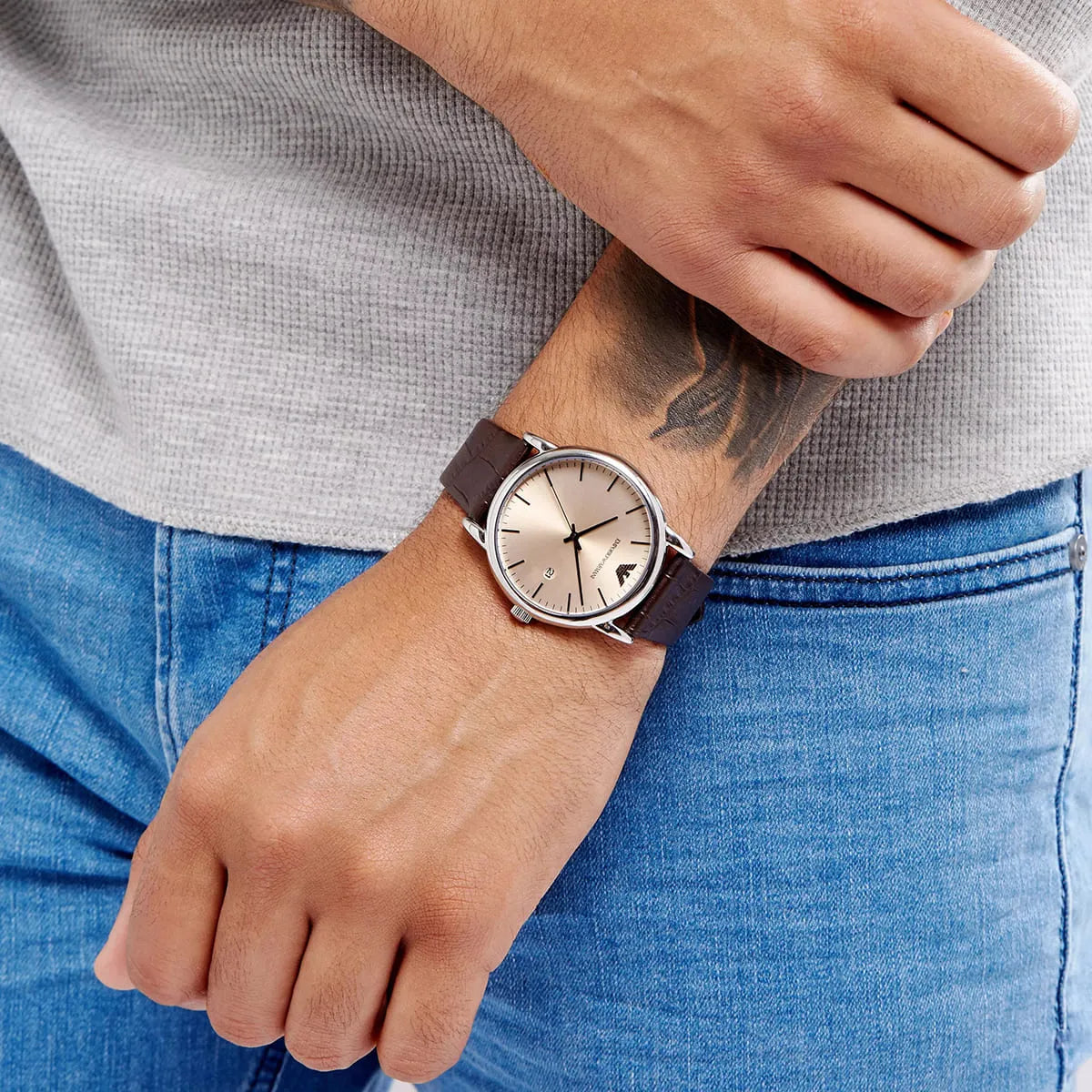 Emporio Armani Luigi watch on wrist showing case and brown leather strap