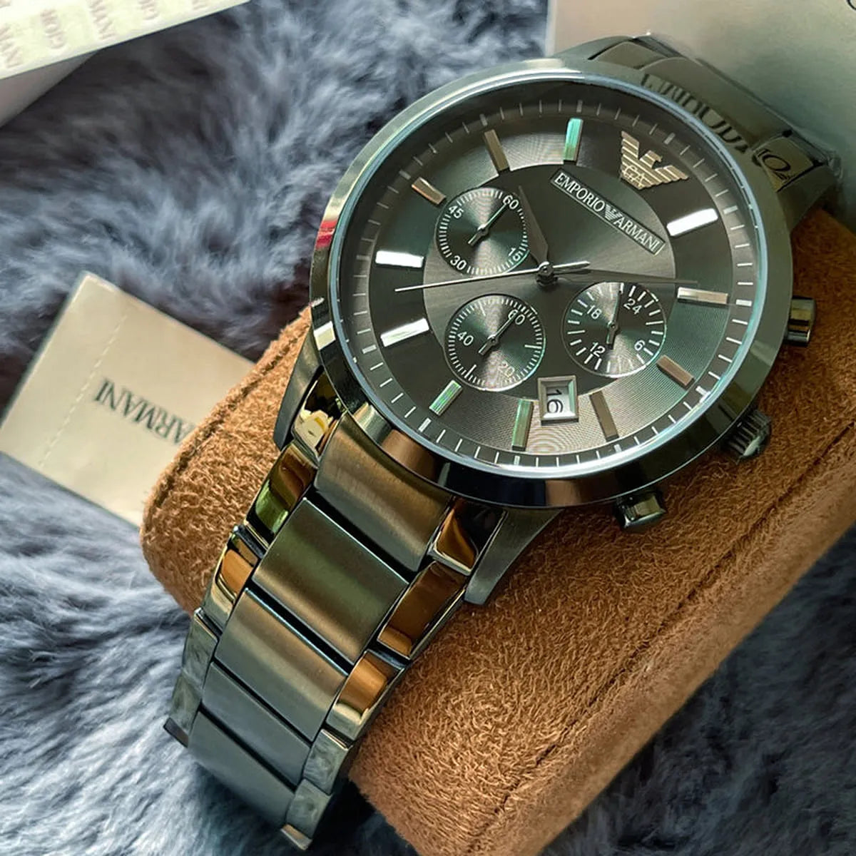 Emporio Armani AR11117 watch on wrist showing grey dial and chronograph subdials detail