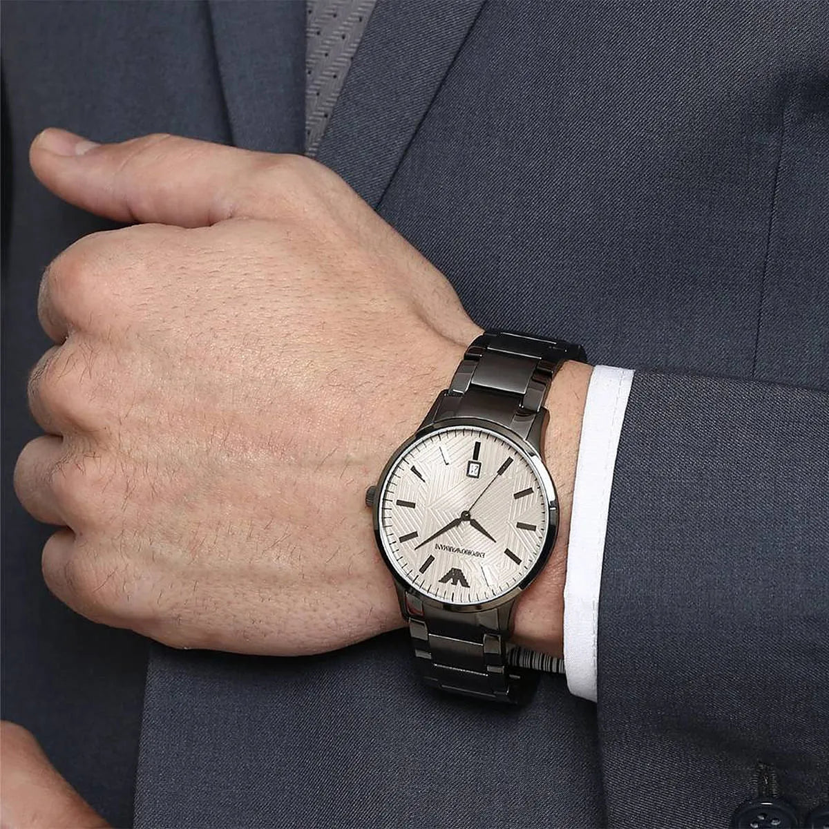 Emporio Armani AR11120 watch on wrist with formal business attire