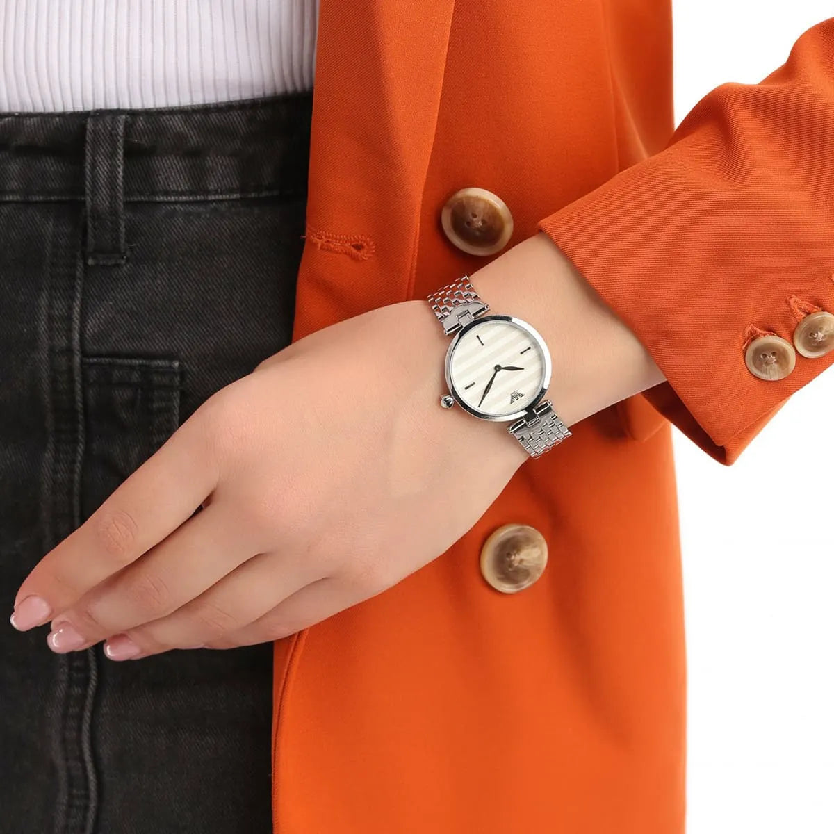 Emporio Armani Arianna watch worn on wrist with white dial and silver bracelet