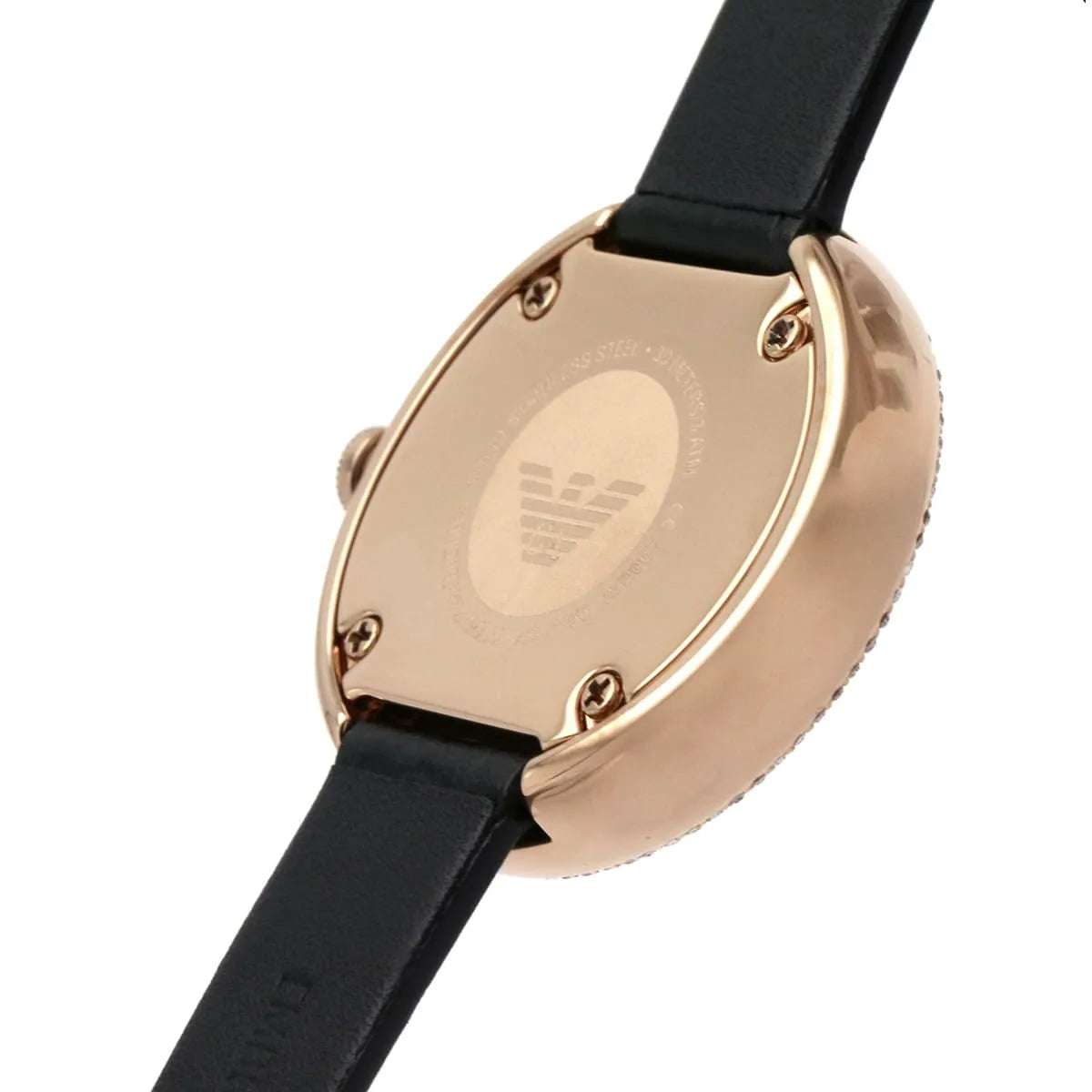 Emporio Armani AR11356 women's watch on wrist showing white dial, Roman numerals, and black leather strap