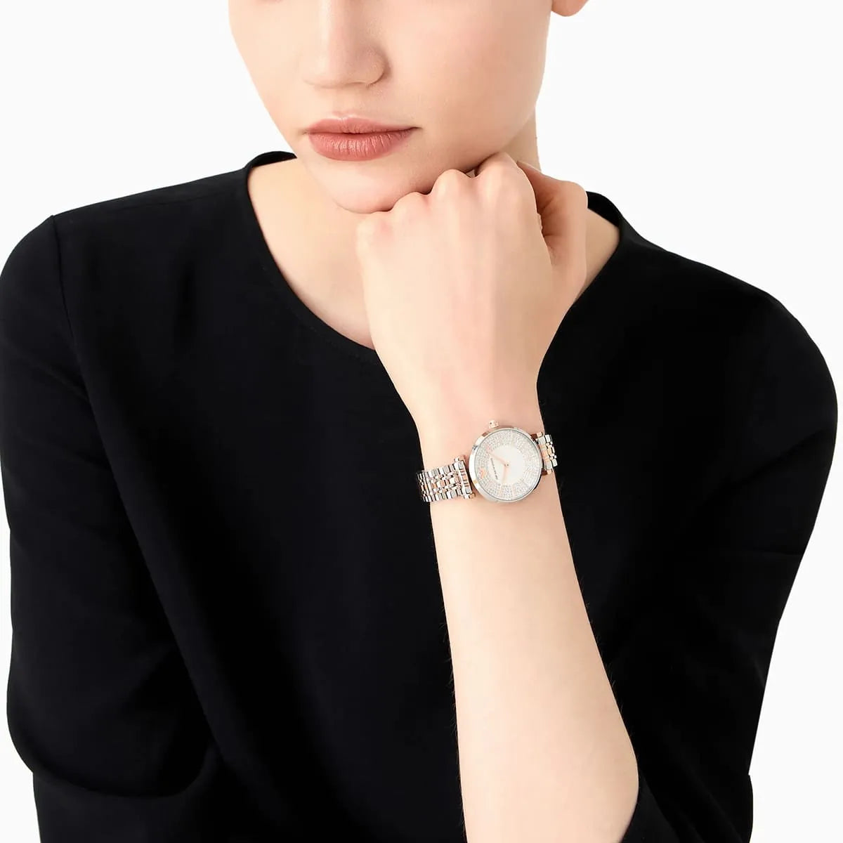 Emporio Armani Gianni T-Bar women's watch worn on wrist with silver sunray crystal dial