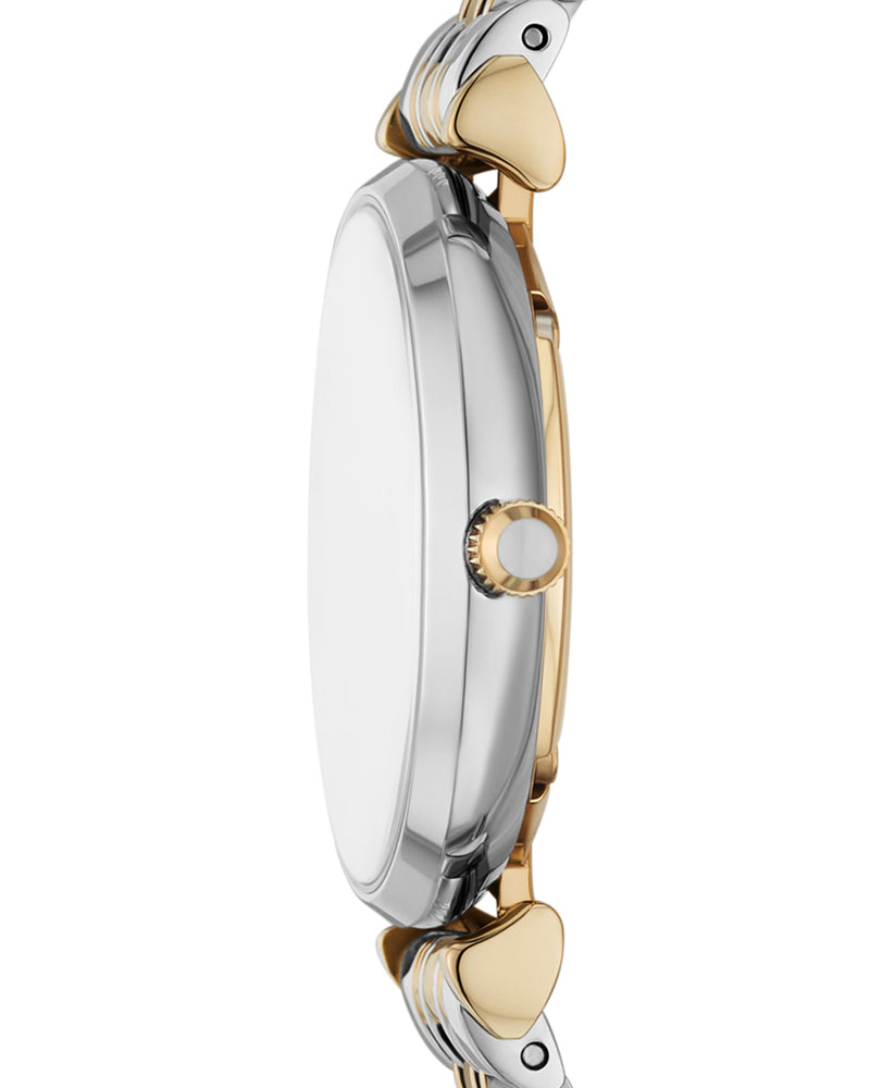 Side profile of two-tone watch case showing mixed metal design and crystal
