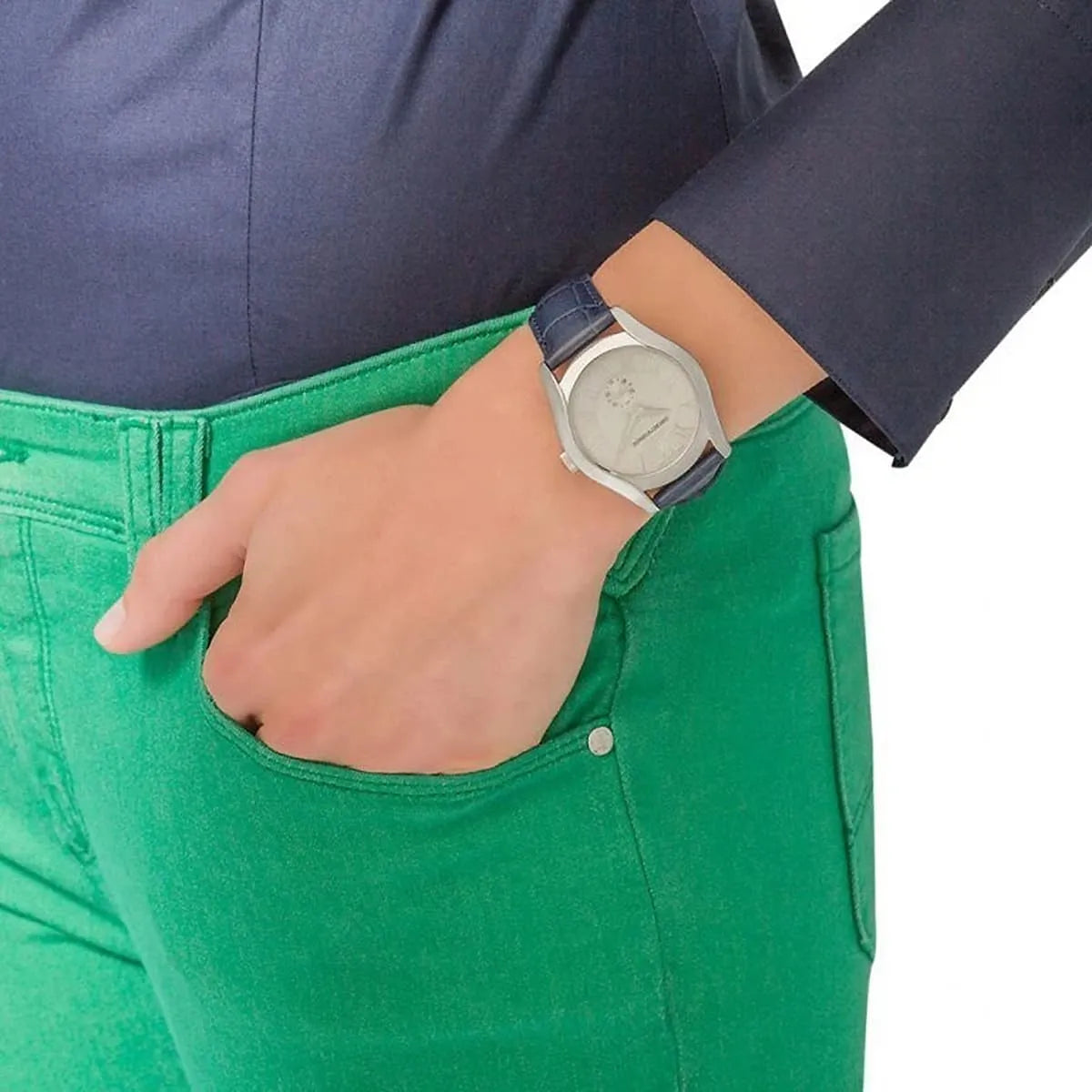 Emporio Armani AR1668 women's watch worn on wrist with green pants and navy jacket