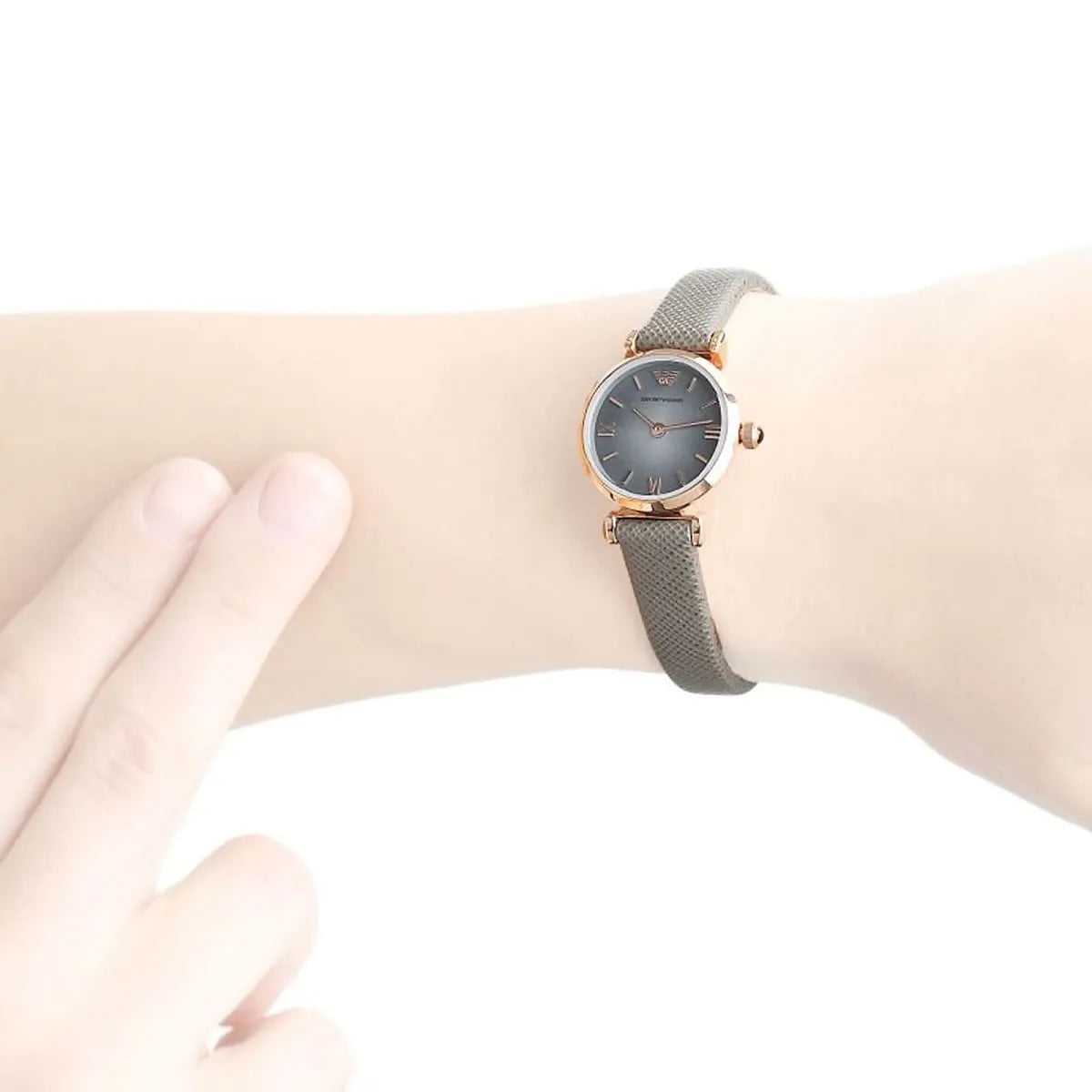 Emporio Armani AR1727 worn on wrist showing rose gold case and gray leather strap