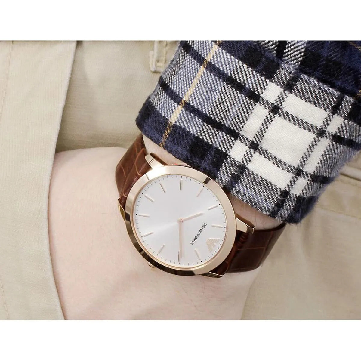 Emporio Armani Dino Slim AR1743 worn on wrist showing white dial and brown leather strap
