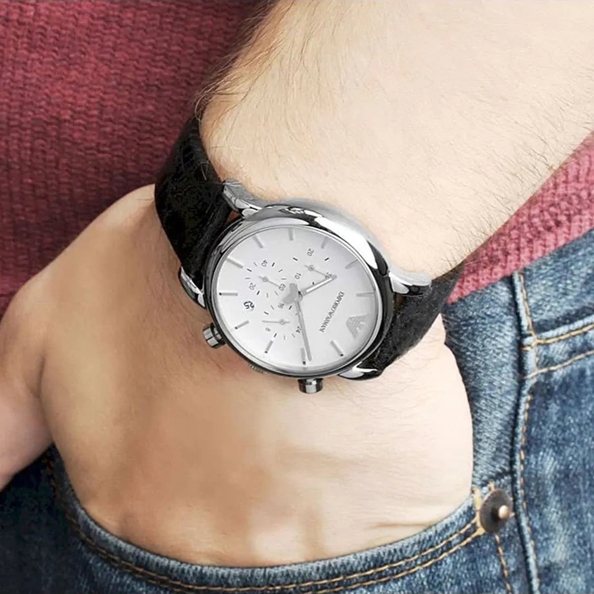Emporio Armani Luigi AR1810 watch worn on wrist with white dial and black leather strap