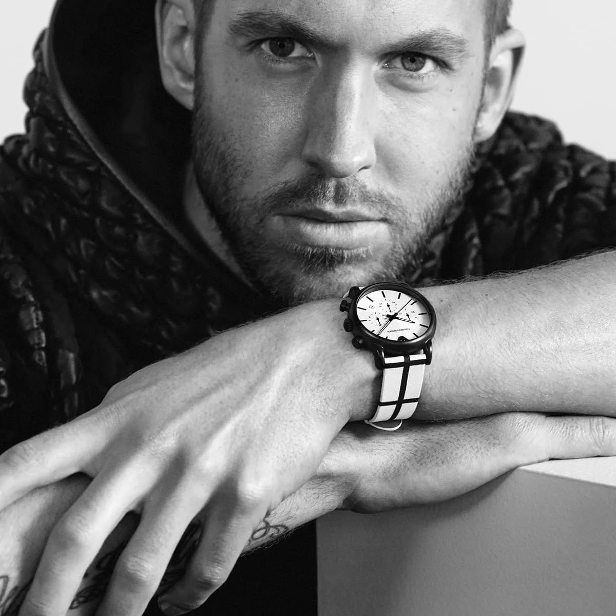 Emporio Armani AR1859 chronograph watch worn on wrist in black and white portrait