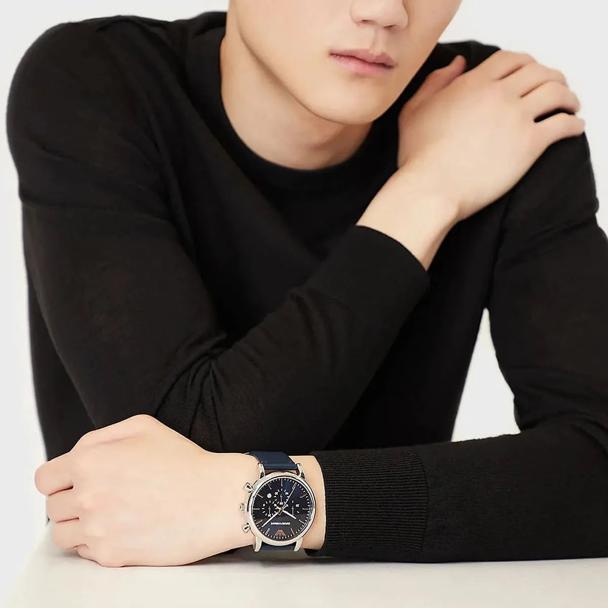 Emporio Armani AR1969 watch worn on wrist with black sleeve detail