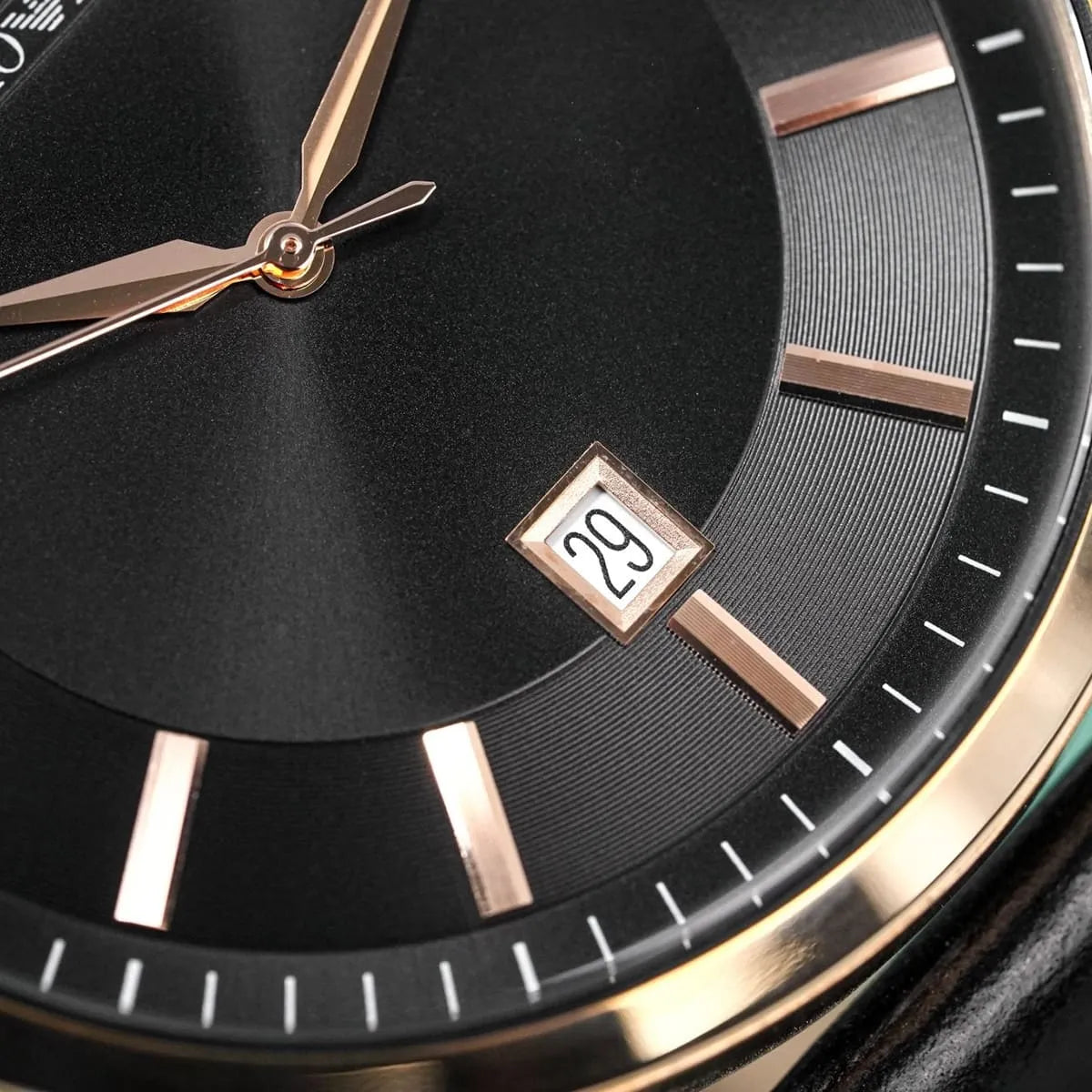 Emporio Armani Renato dial close-up showing date window and textured black sunburst face