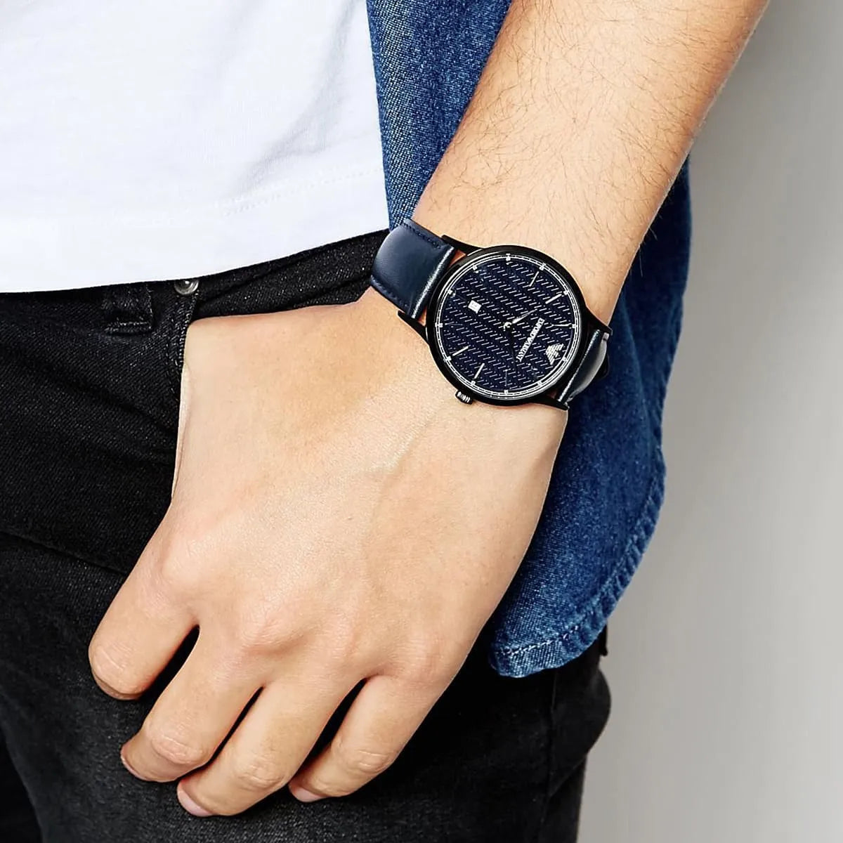 Emporio Armani Renato AR2479 watch worn on wrist with navy dial and blue leather strap