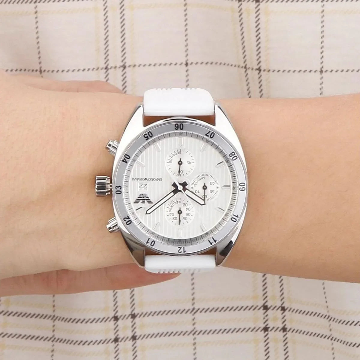 Emporio Armani AR5929 chronograph watch worn on wrist with white strap