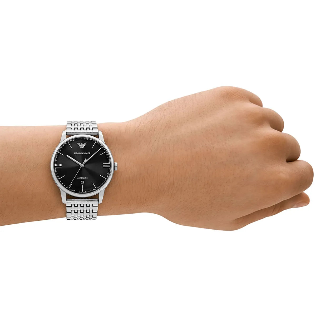 AR60081 automatic watch worn on wrist with black dial and stainless steel bracelet