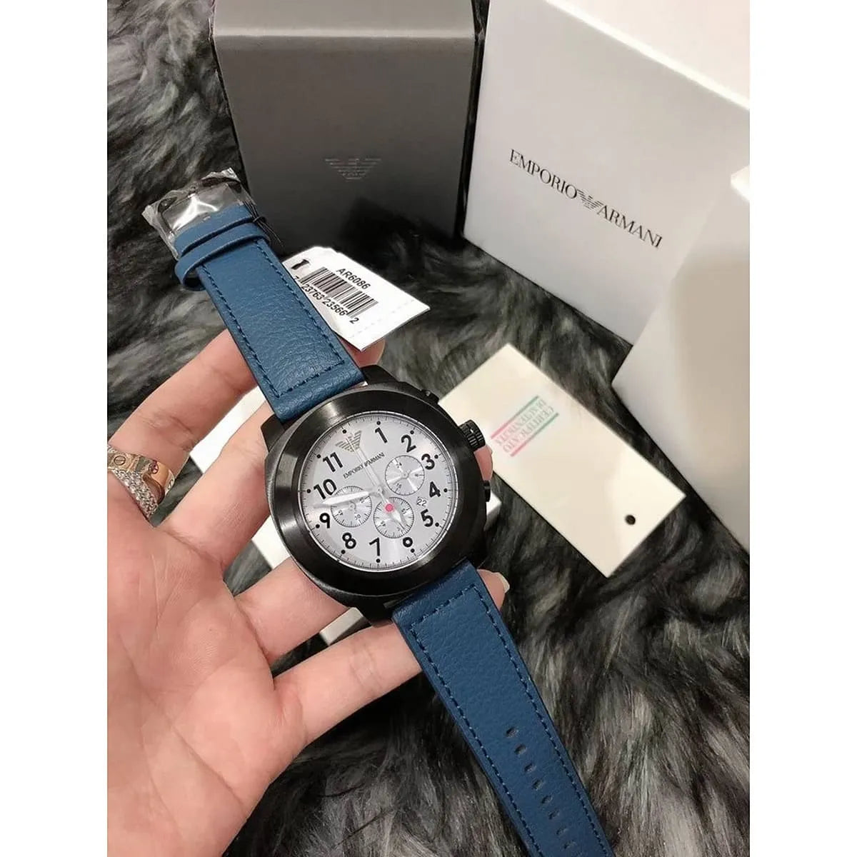 AR6086 Emporio Armani chronograph watch worn on wrist with original box