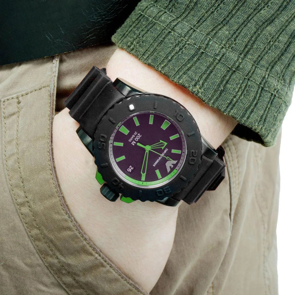 AR6102 Acqua watch worn on wrist showing black case, green accents, and dial