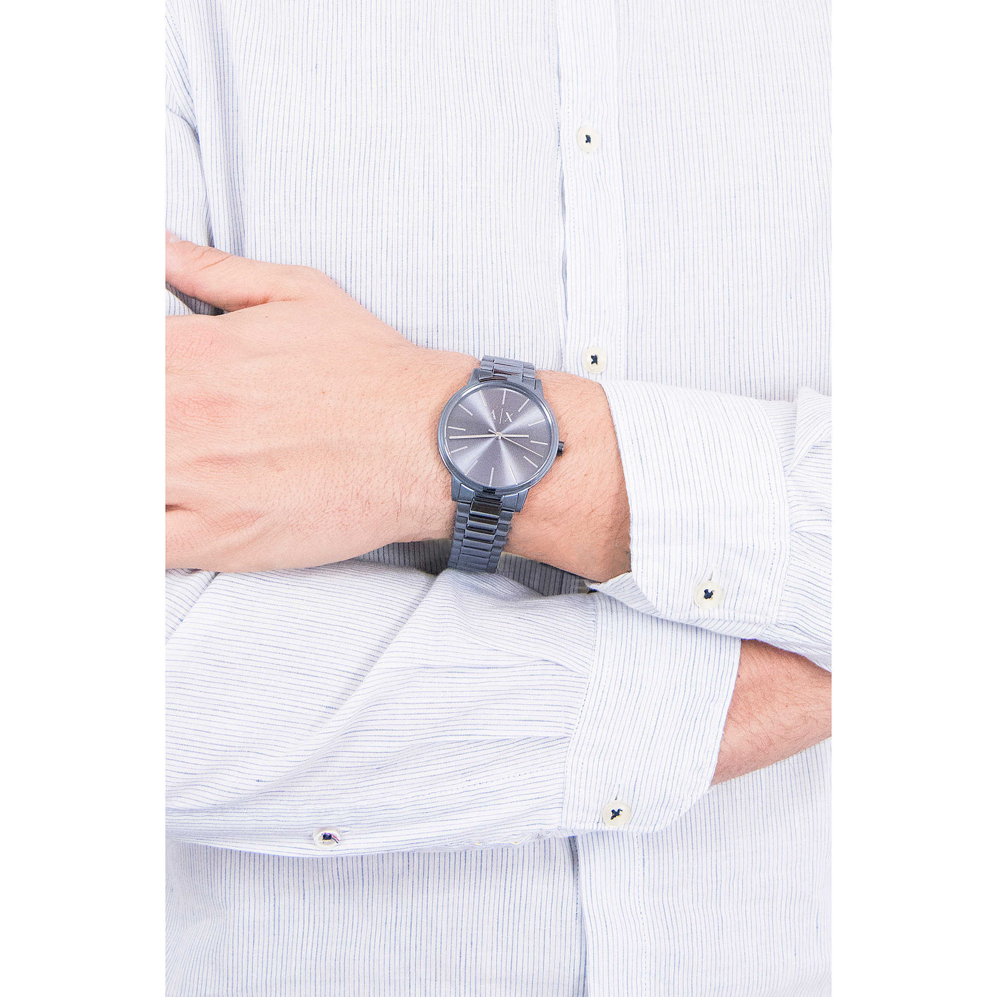 Armani Exchange Cayde AX2702 men's watch worn on wrist with blue stainless steel bracelet