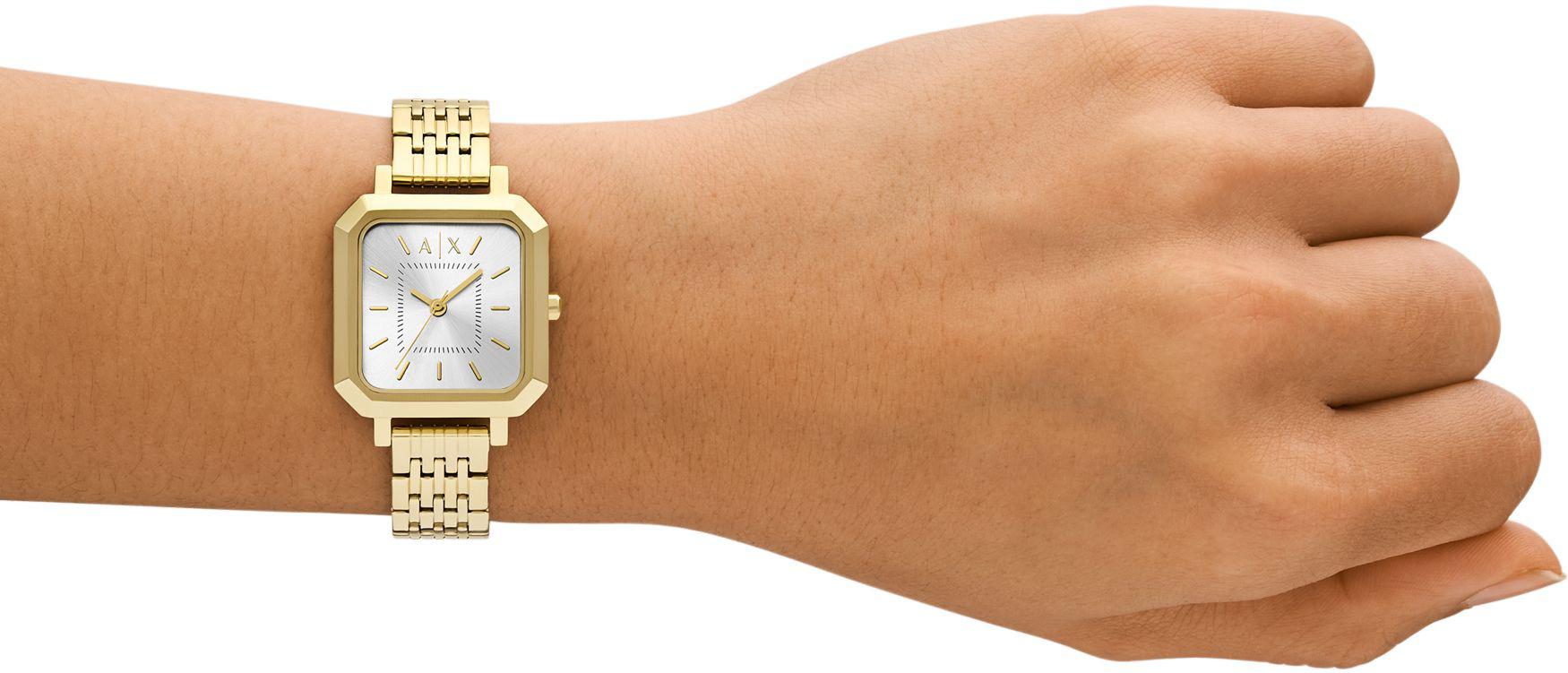 Armani Exchange Cayde AX5725 women's watch on wrist with gold-tone bracelet