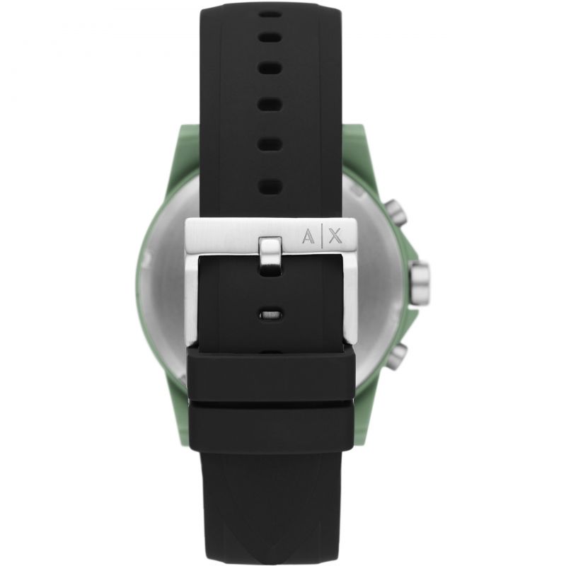 Caseback view showing black strap attachment to green case