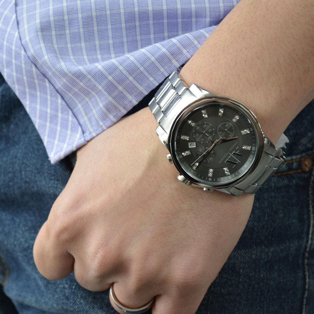 AX2092 Armani Exchange men's chronograph watch worn on wrist with blue striped shirt