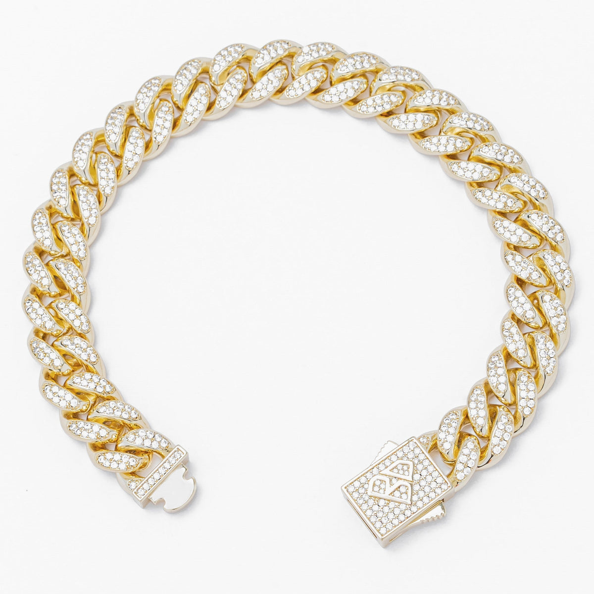 Gold Cuban link bracelet displayed at angle showing cubic zirconia-encrusted links and clasp