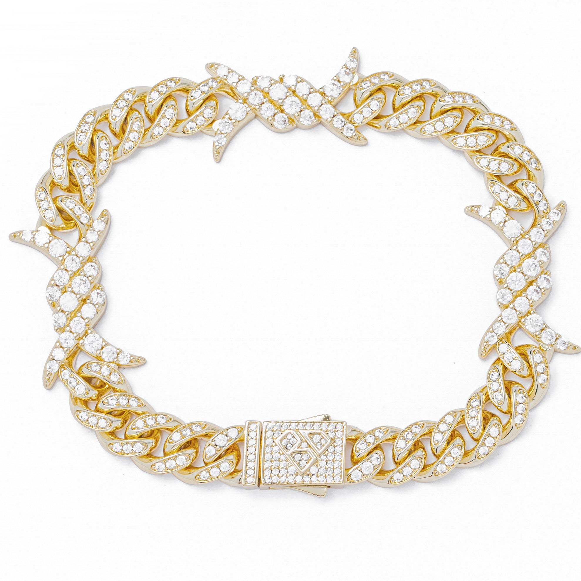 Gold 10MM curb chain bracelet with spiked horns and cubic zirconia stones, front view