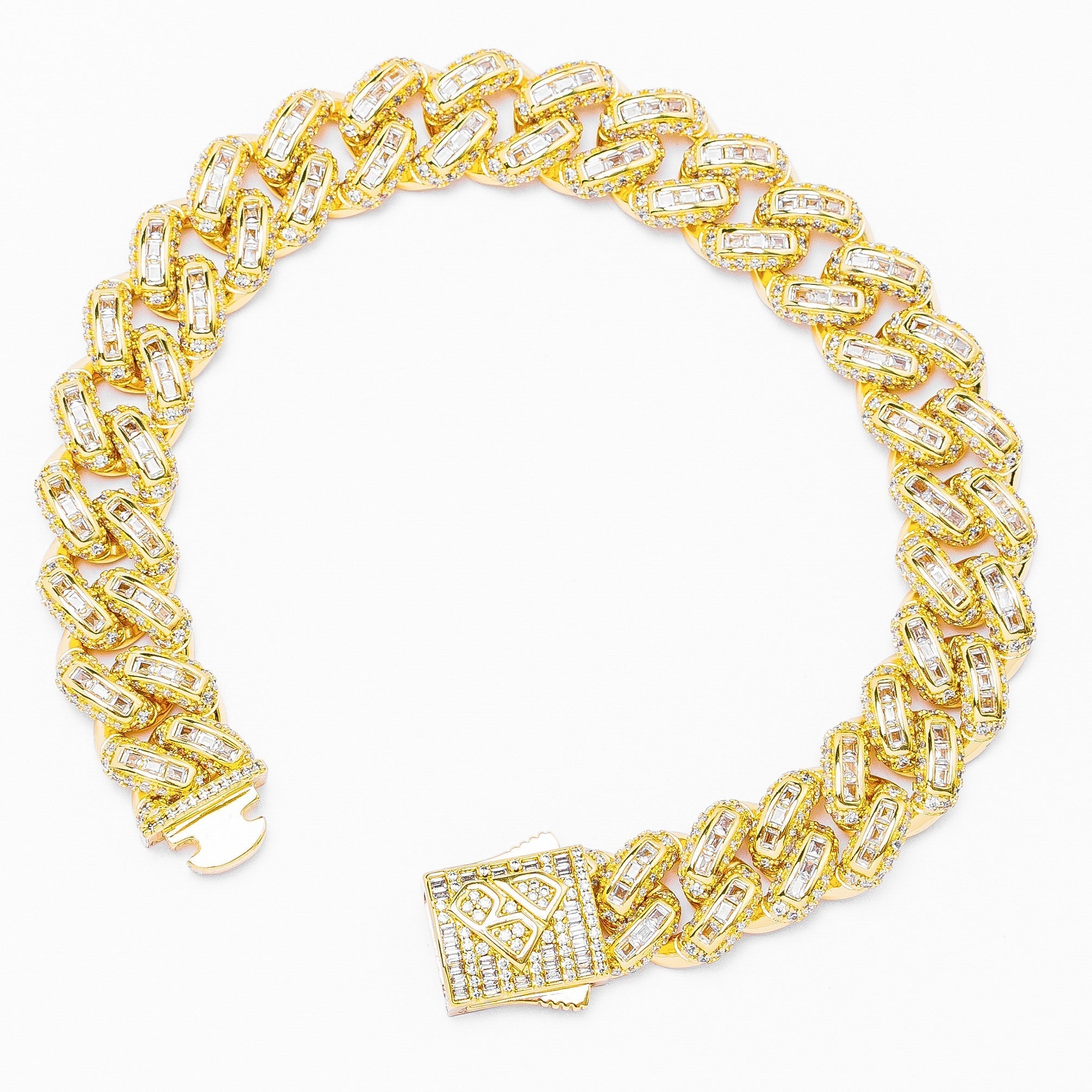 Gold Cuban link bracelet showing 12MM links and diamond-cut iced-out clasp