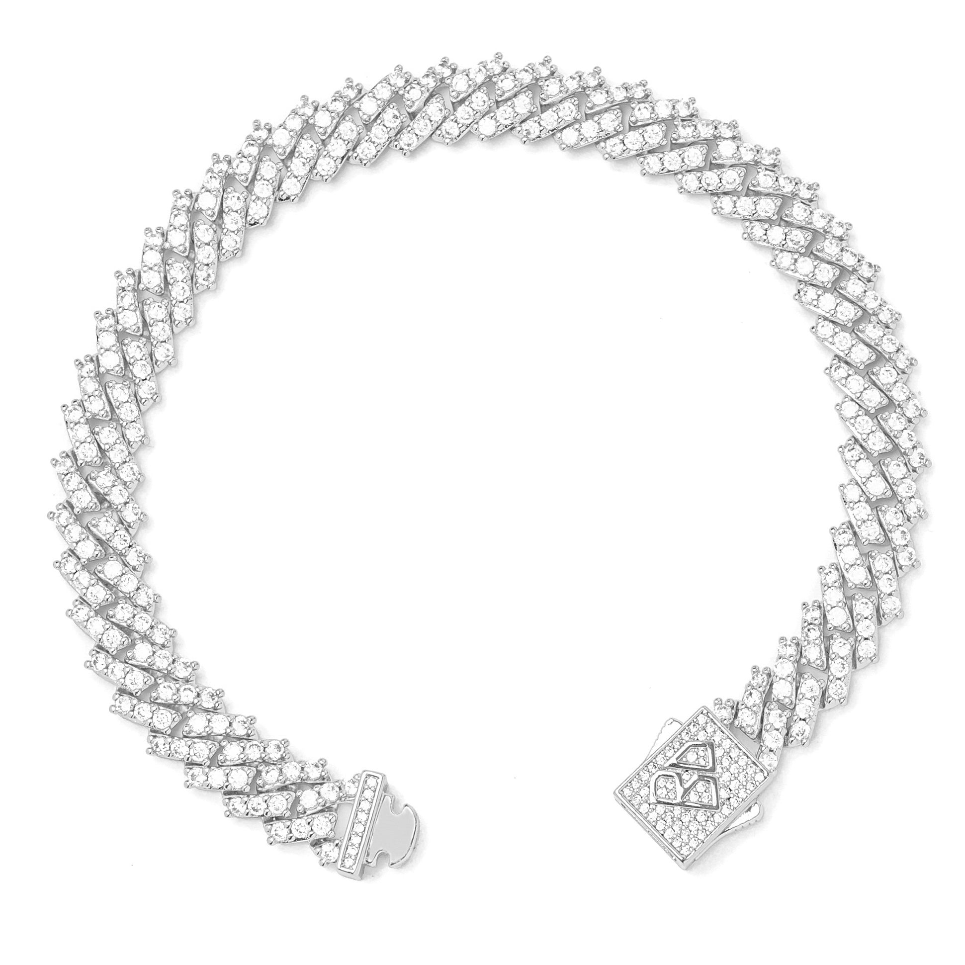 Iced out Cuban bracelet shown at angle with open box clasp and diamond prong setting