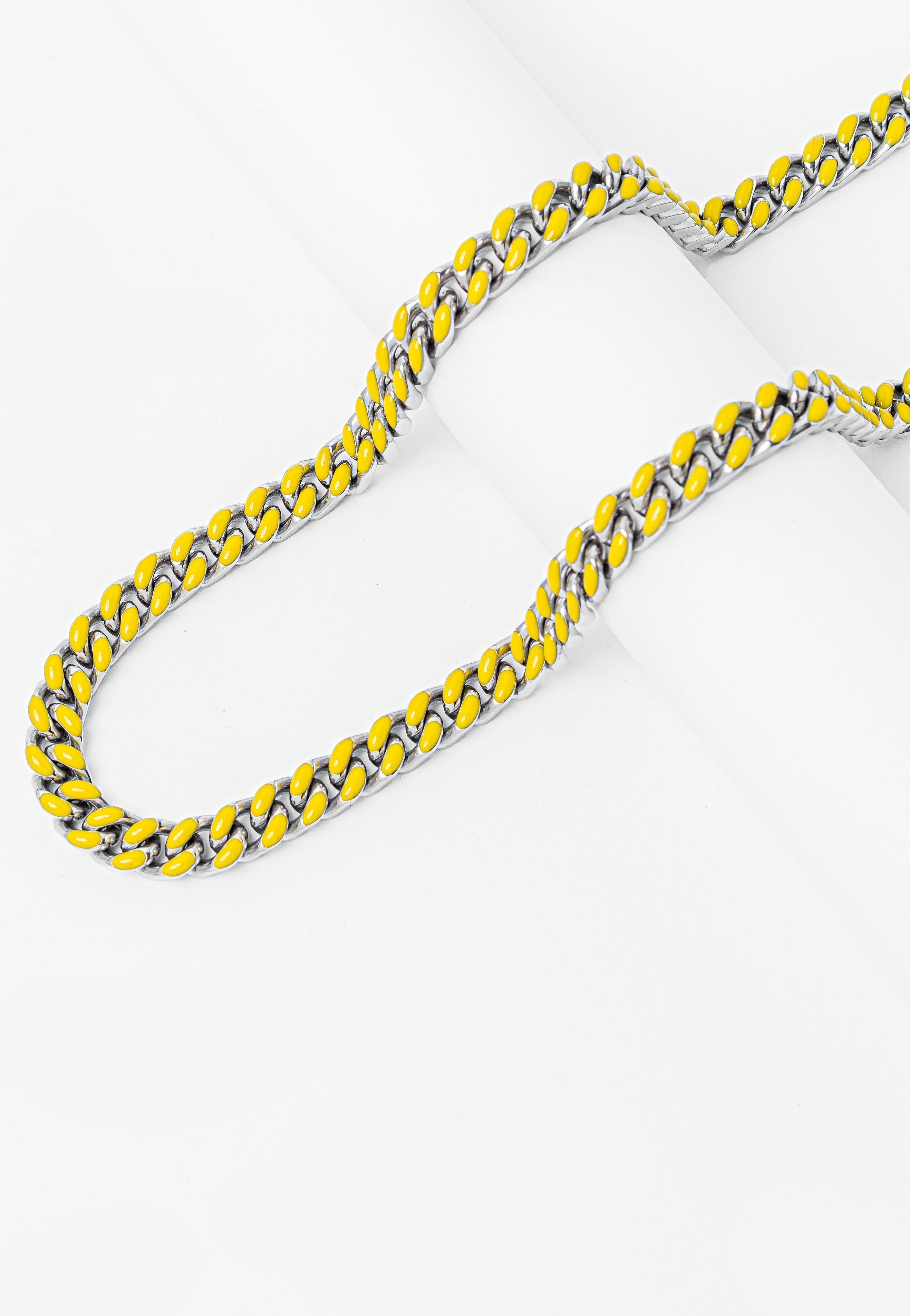 Full length view of Big Daddy Cuban chain showing yellow and steel coloring