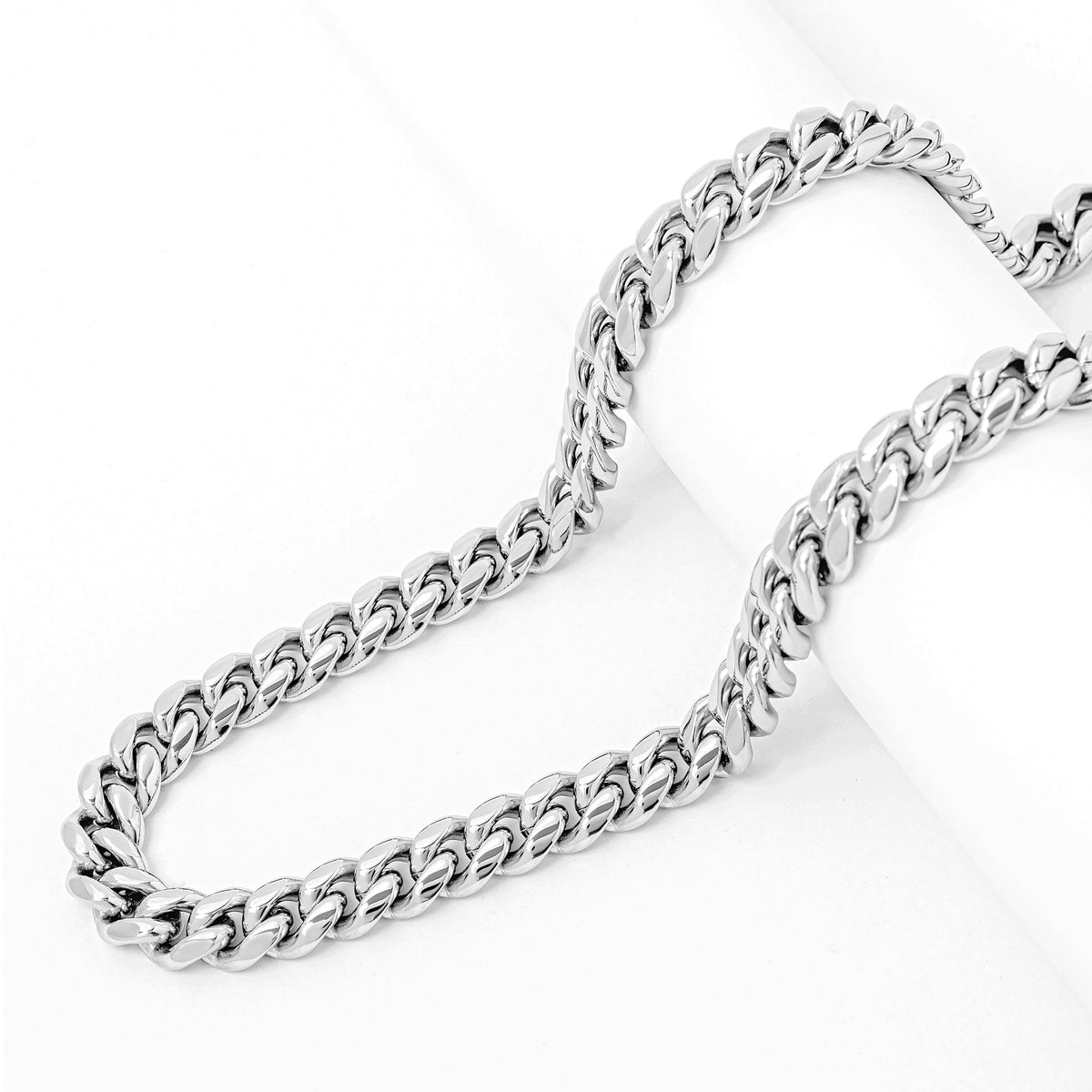 Big Daddy 8MM Cuban link silver chain laid flat showing link texture and weight